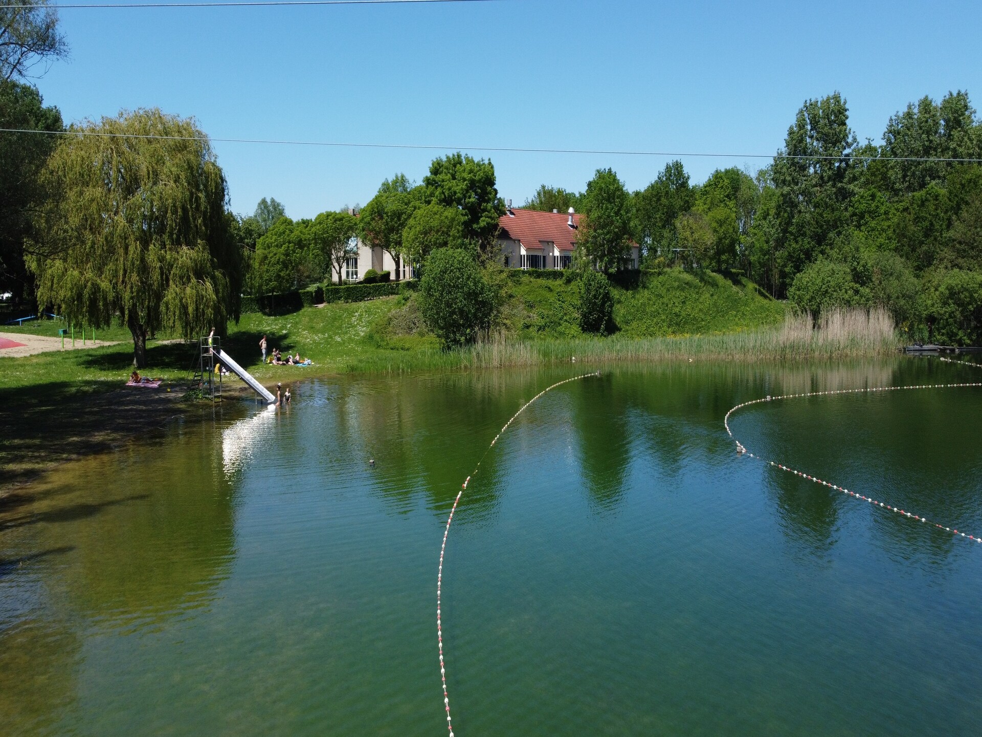 Vrijstaand vakantiehuis op 't Broeckhuys, aan recreatiemeer in Ewijk - foto 21