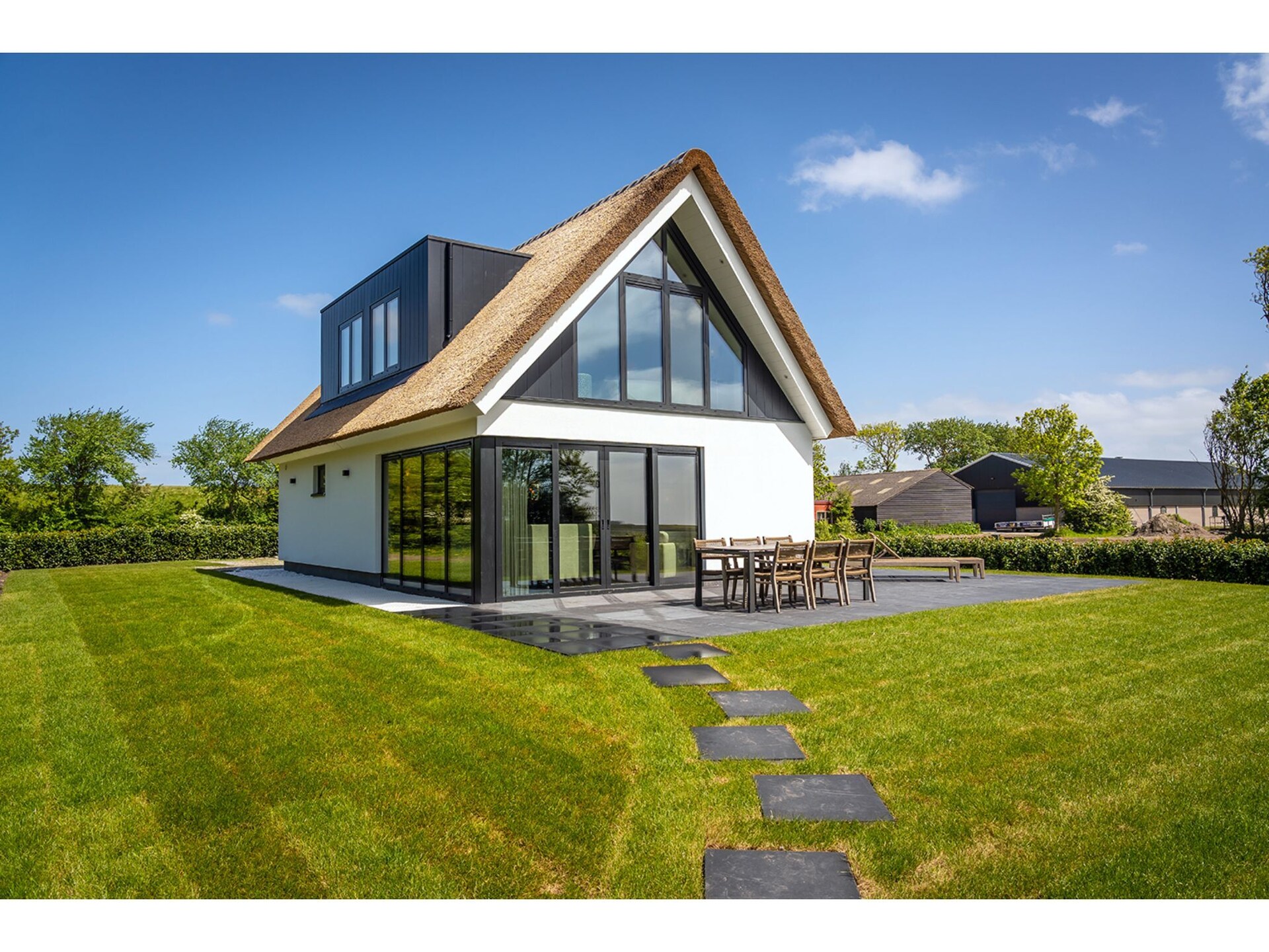 Luxe villa bij De Cocksdorp met uitzicht op vuurtoren en Waddenzee - foto 2