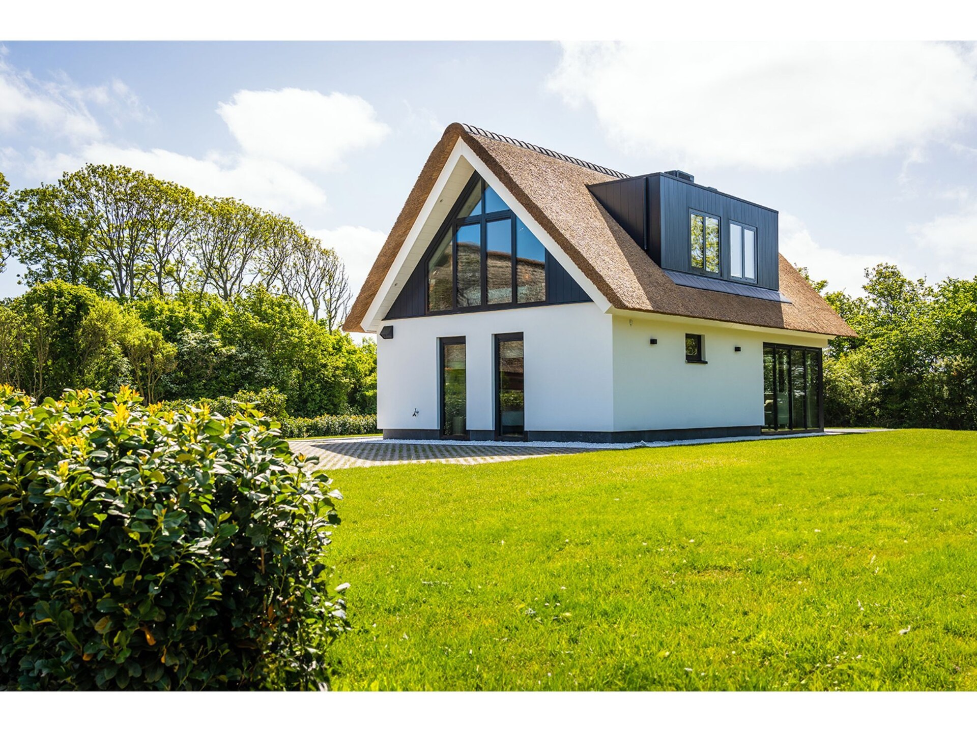 Luxe villa bij De Cocksdorp met uitzicht op vuurtoren en Waddenzee - foto 8