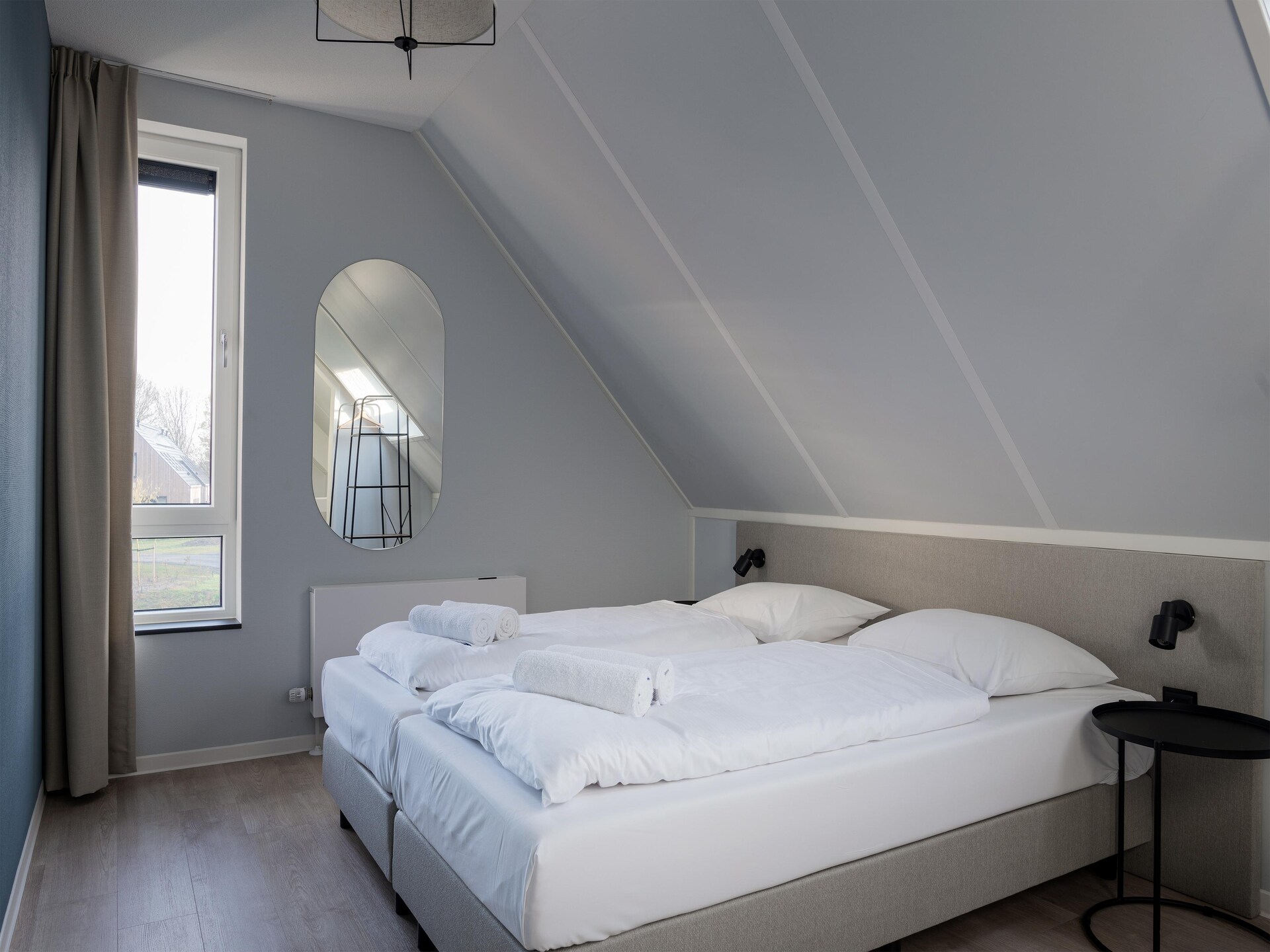 Luxe vrijstaand vakantiehuis aan het water op Resort Nieuwvliet-Bad - foto 5