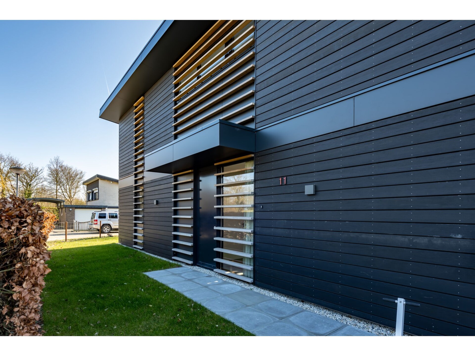 Modern vakantiehuis met buitenhaard aan Veerse Meer in Kamperland - foto 24