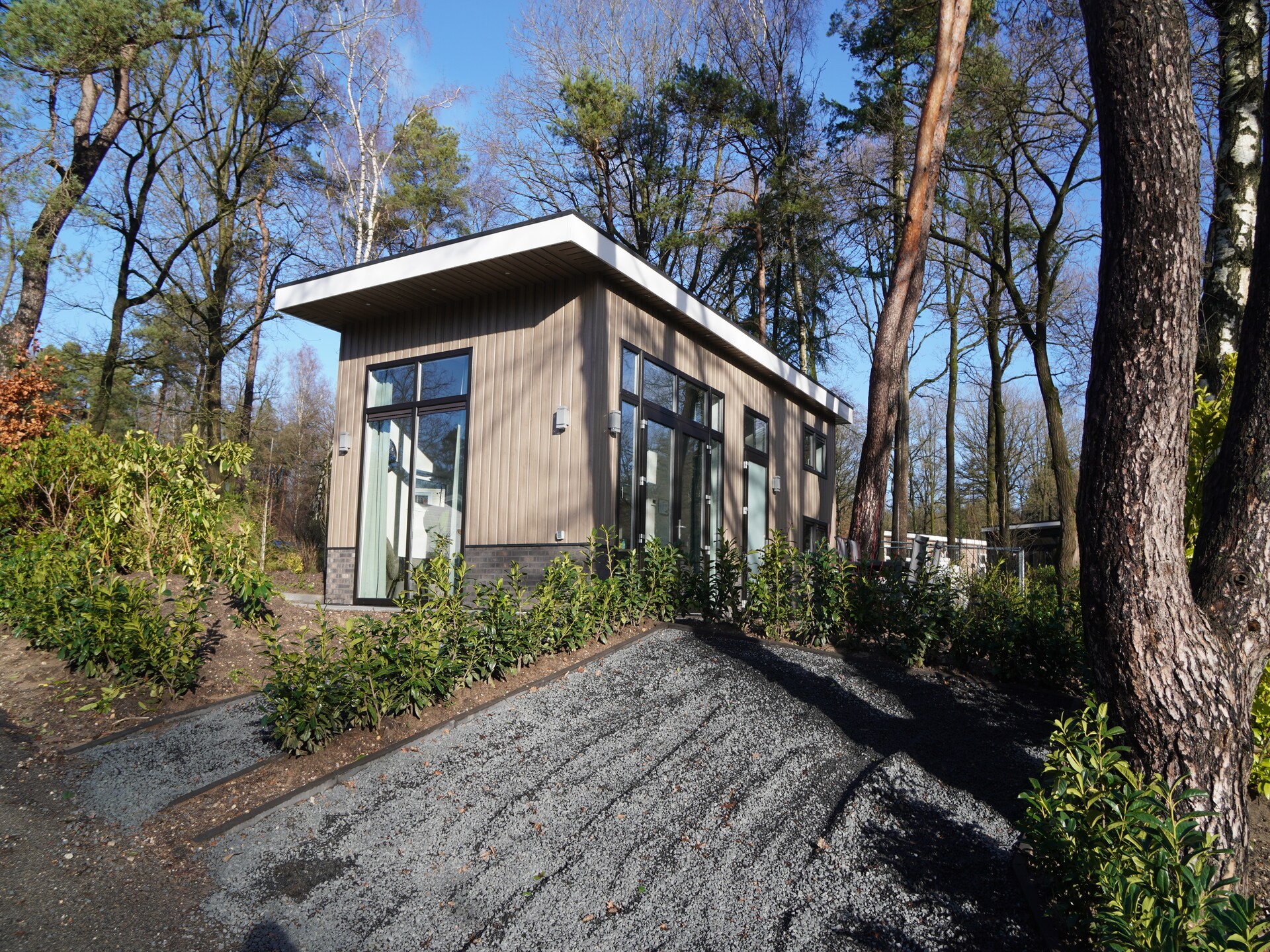 Modern boshuisje met haard op huisdiervriendelijk vakantiepark in Hoenderloo - foto 7