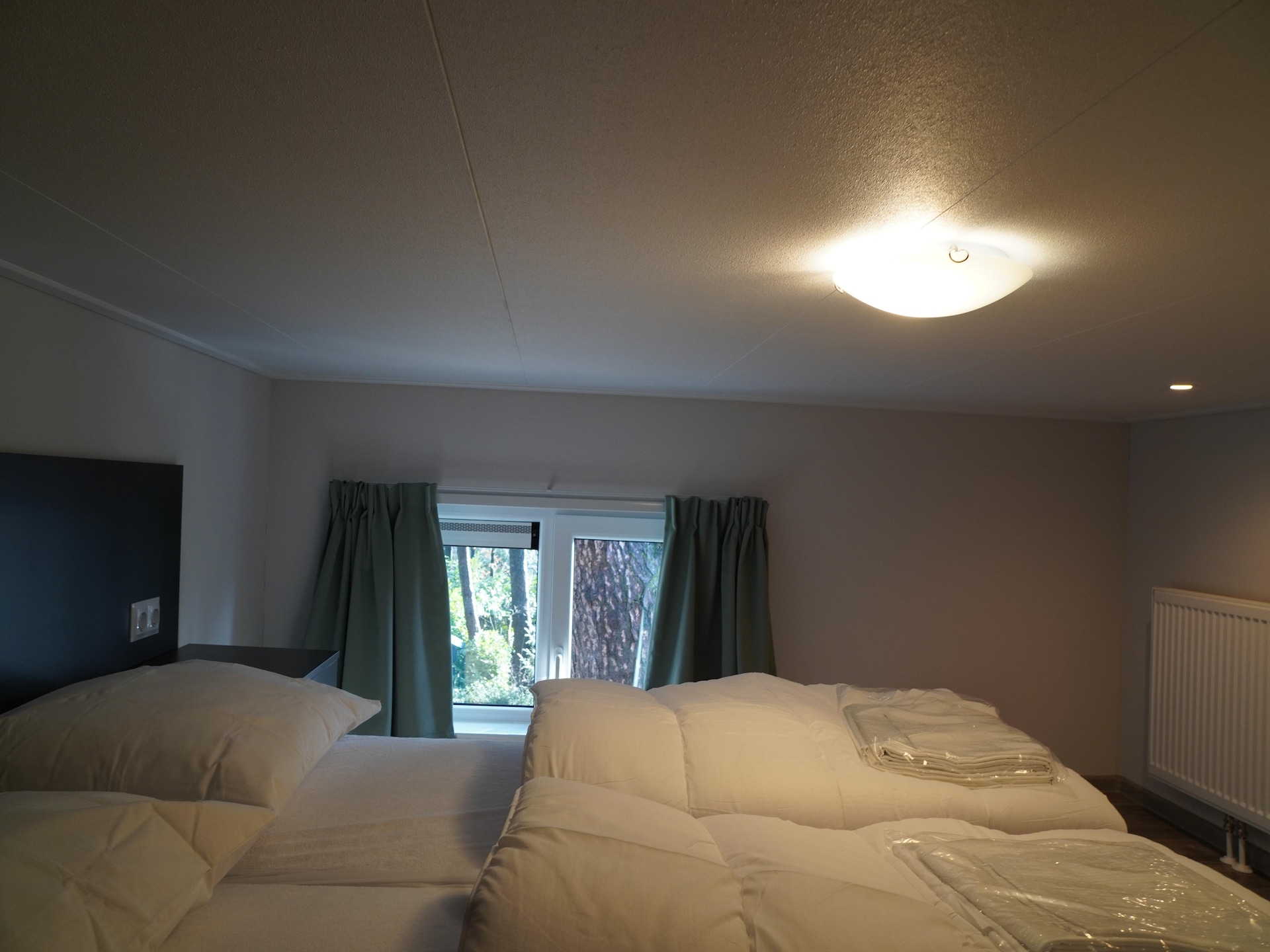 Modern boshuisje met haard op huisdiervriendelijk vakantiepark in Hoenderloo - foto 12