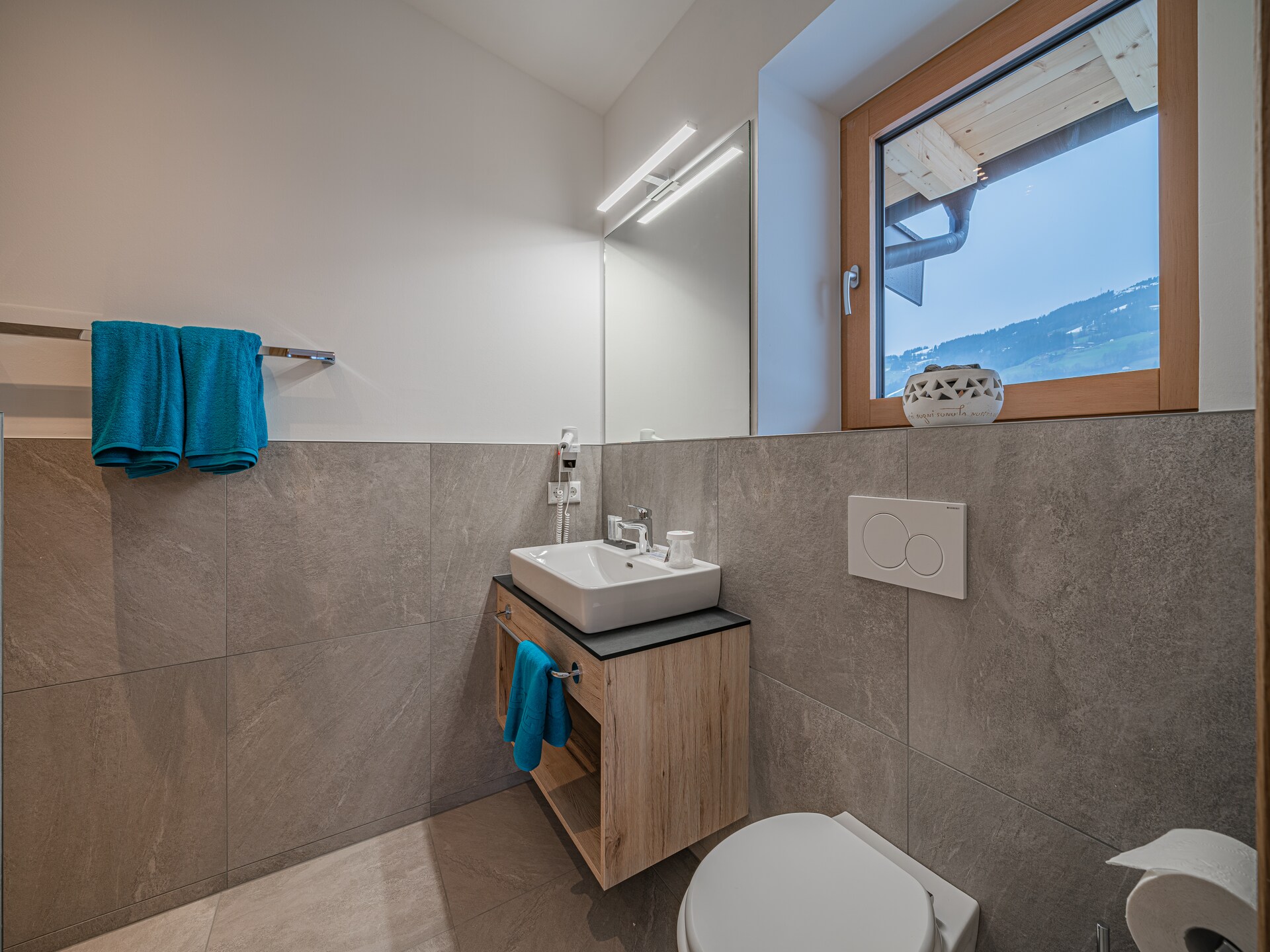 Ruim appartement Haus Andrea Cäciel in Brixen im Thale met tuin en zwemvijver - foto 12