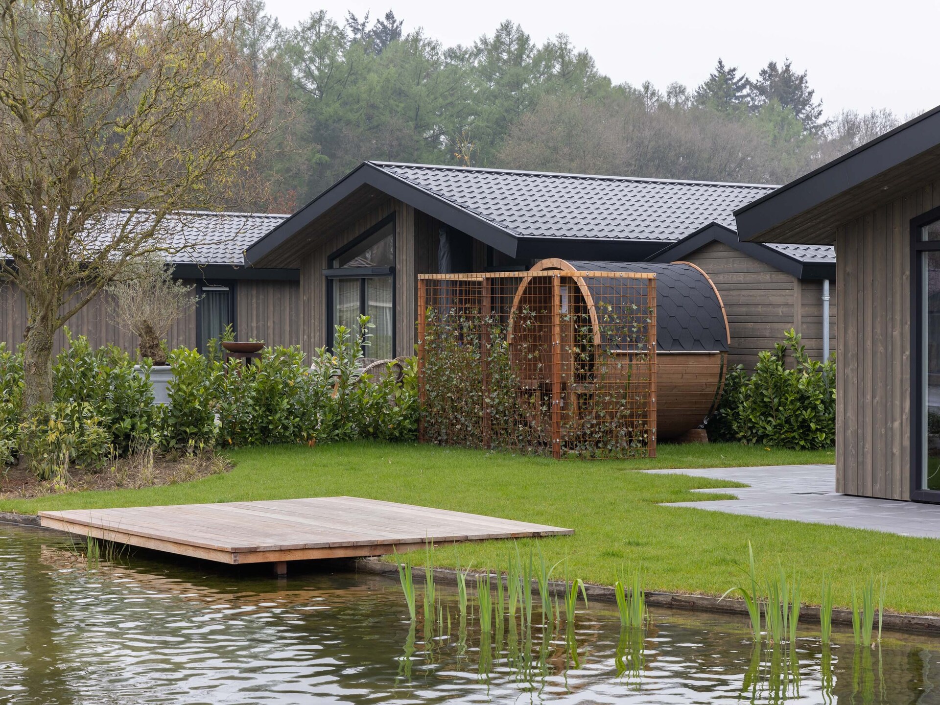 Luxe ecovilla aan het water in Oirschot met buitensauna - foto 37