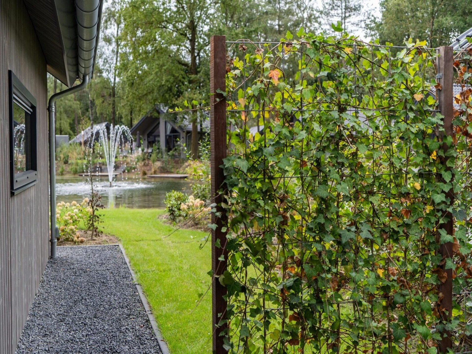 Luxe ecovilla aan het water in Oirschot met buitensauna - foto 12