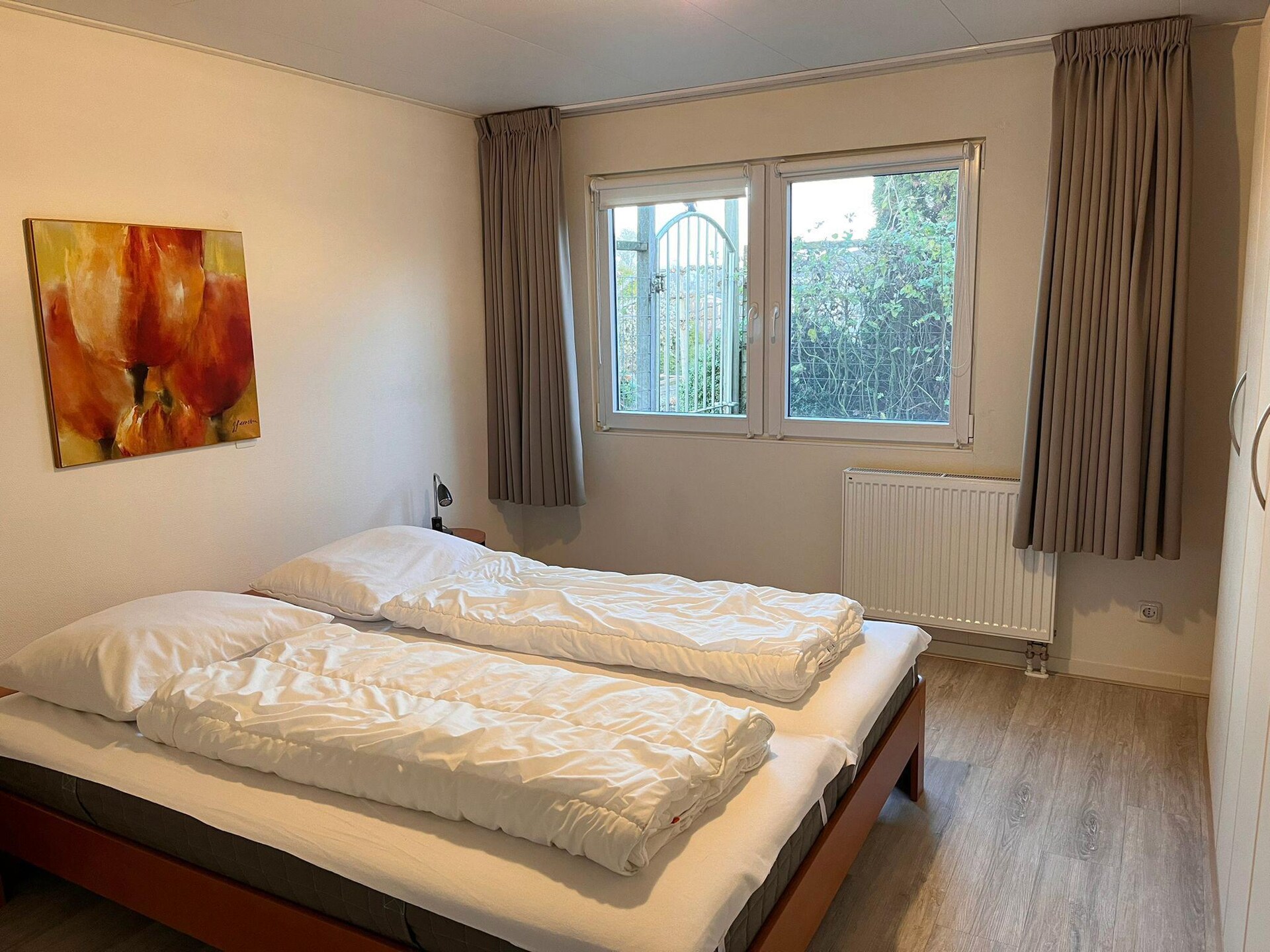 Vrijstaande bungalow bij strand en IJsselmeer in Makkum, Friesland - foto 17