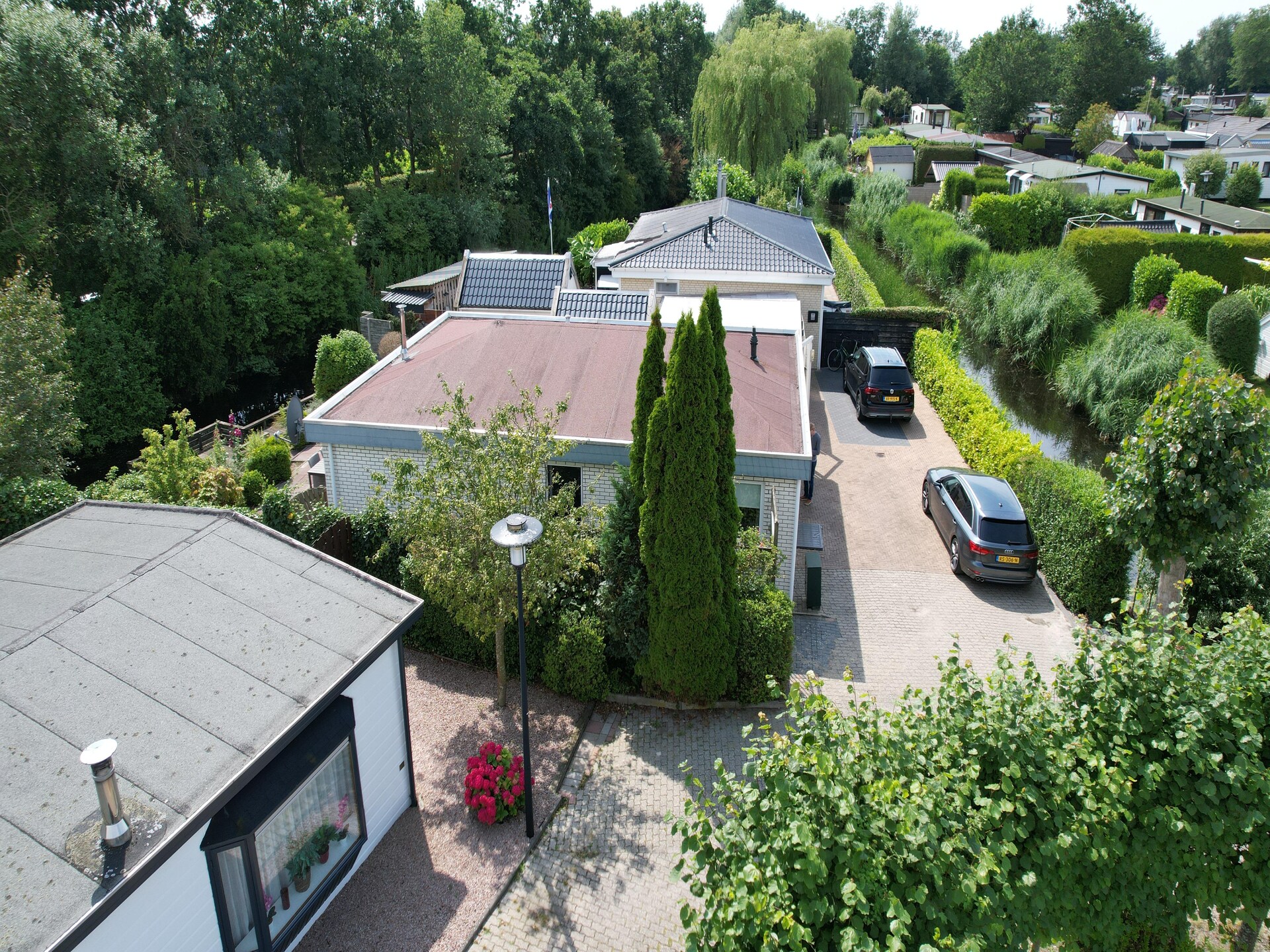 Vrijstaande bungalow bij strand en IJsselmeer in Makkum, Friesland - foto 25