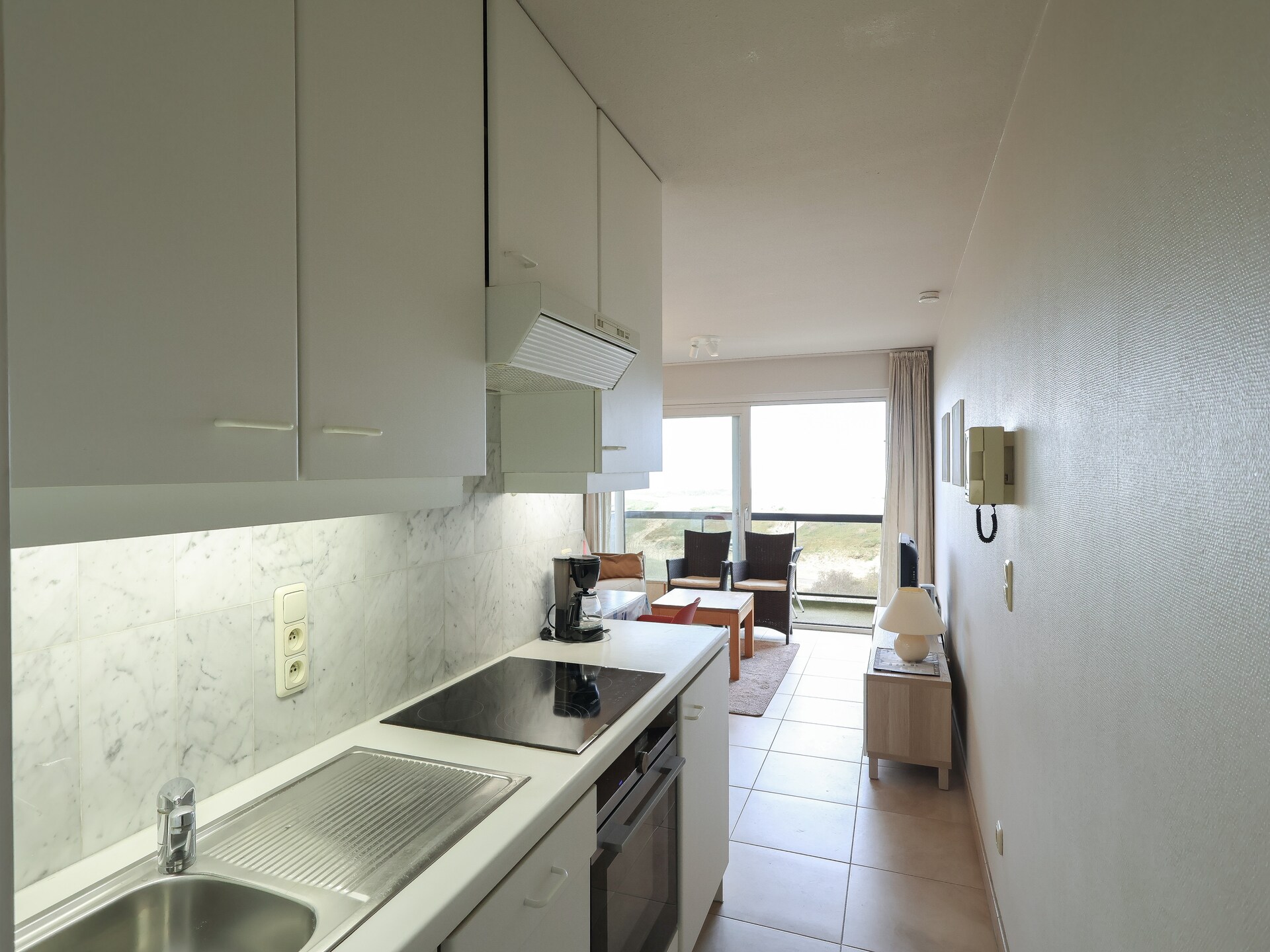 Knus appartement op 2e verdieping met balkon, vlakbij strand en golfbaan - foto 2