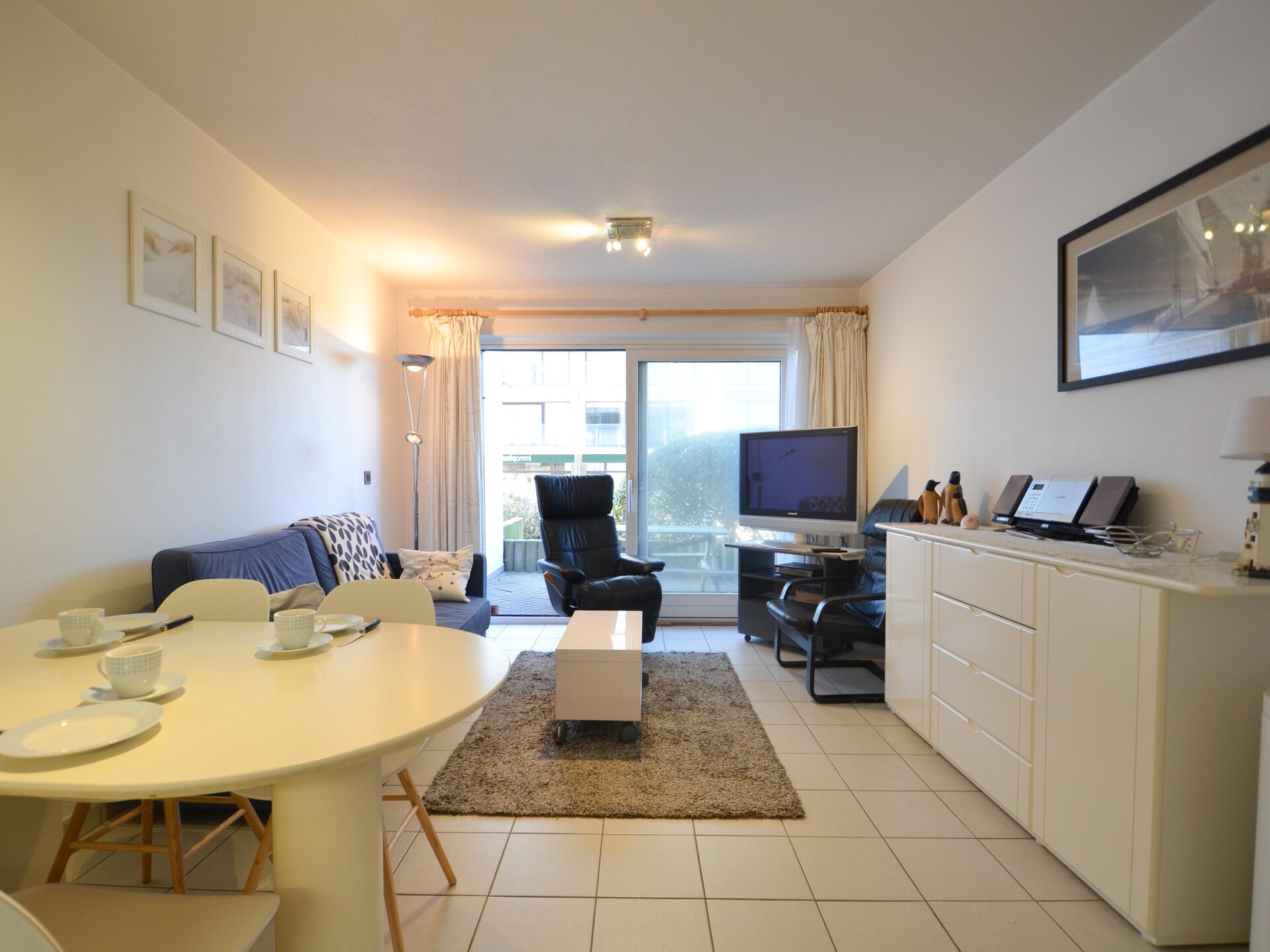 Licht appartement met zonneterras op loopafstand van strand en duinen - foto 11