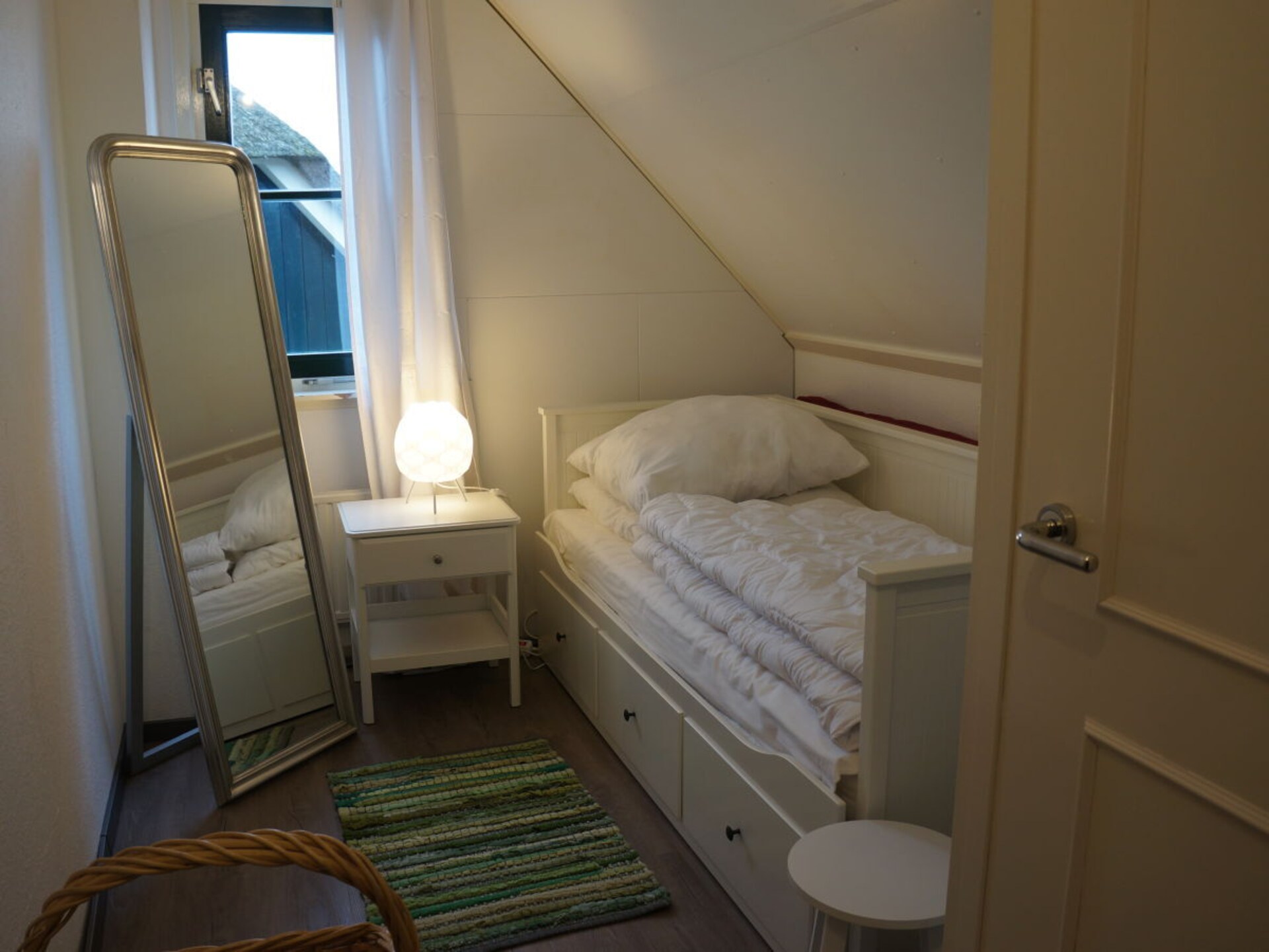 Rietgedekt vakantiehuis met uitzicht op meer in Callantsoog - foto 22