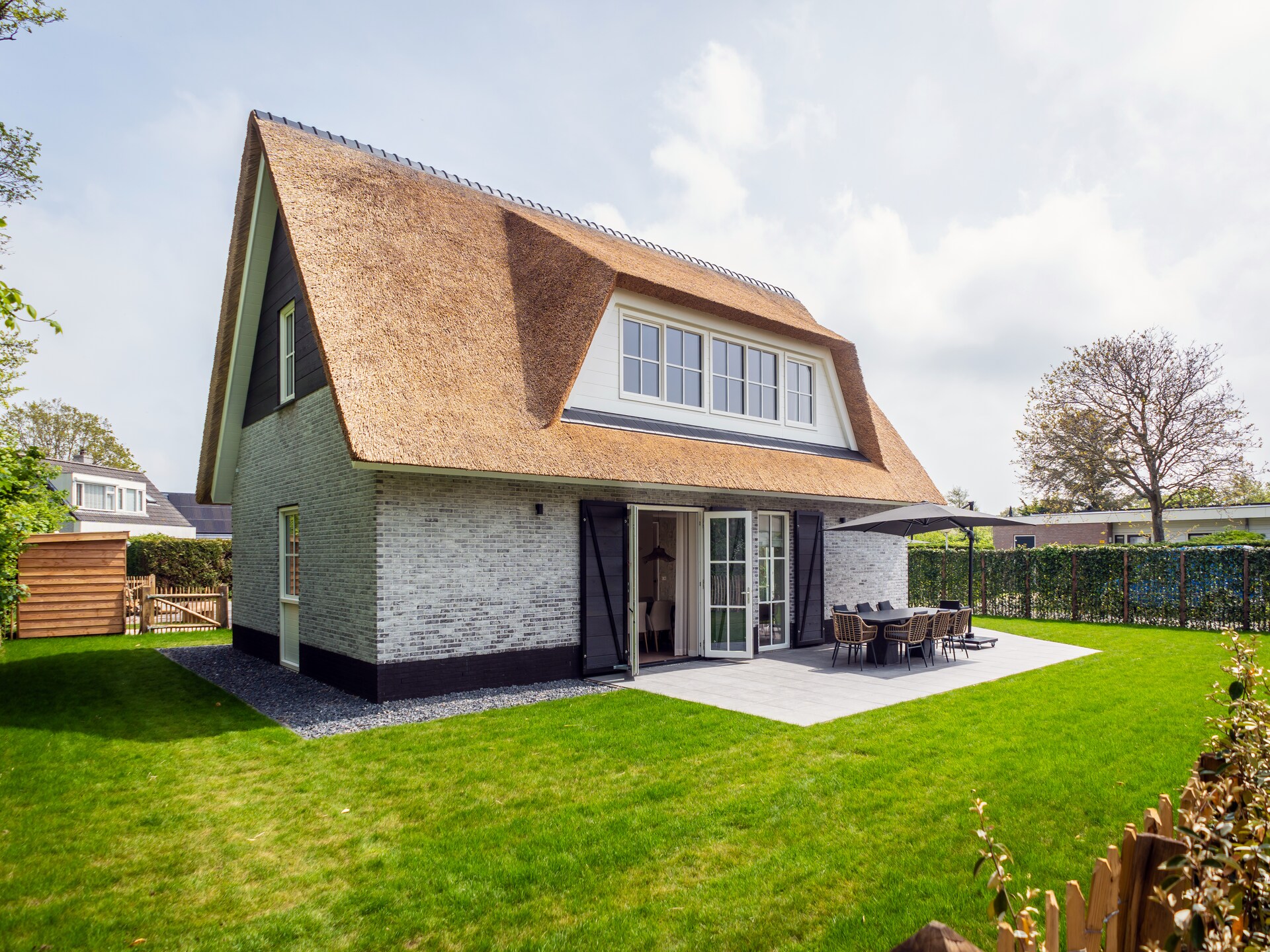 Luxe rietgedekte wellnessvilla voor 8 personen in De Koog, Texel - foto 26
