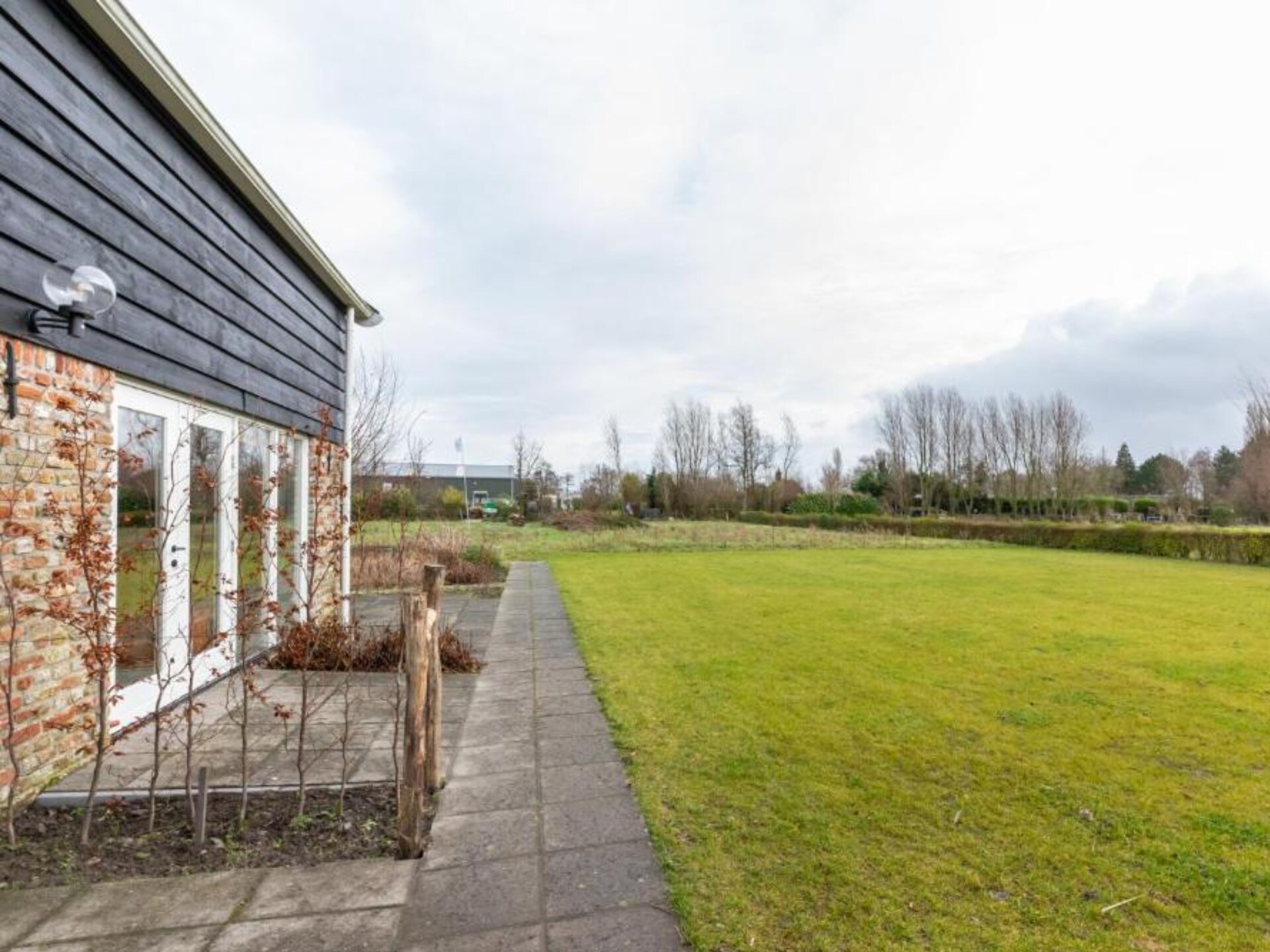 De Kleine Pionier: Modern vakantiehuis met tuin in hartje Grijpskerke - foto 16