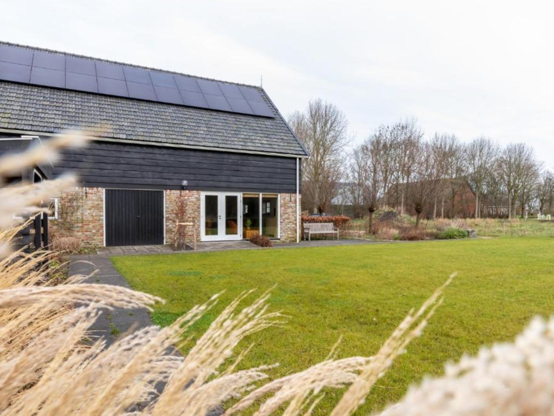 De Kleine Pionier: Modern vakantiehuis met tuin in hartje Grijpskerke - foto 18