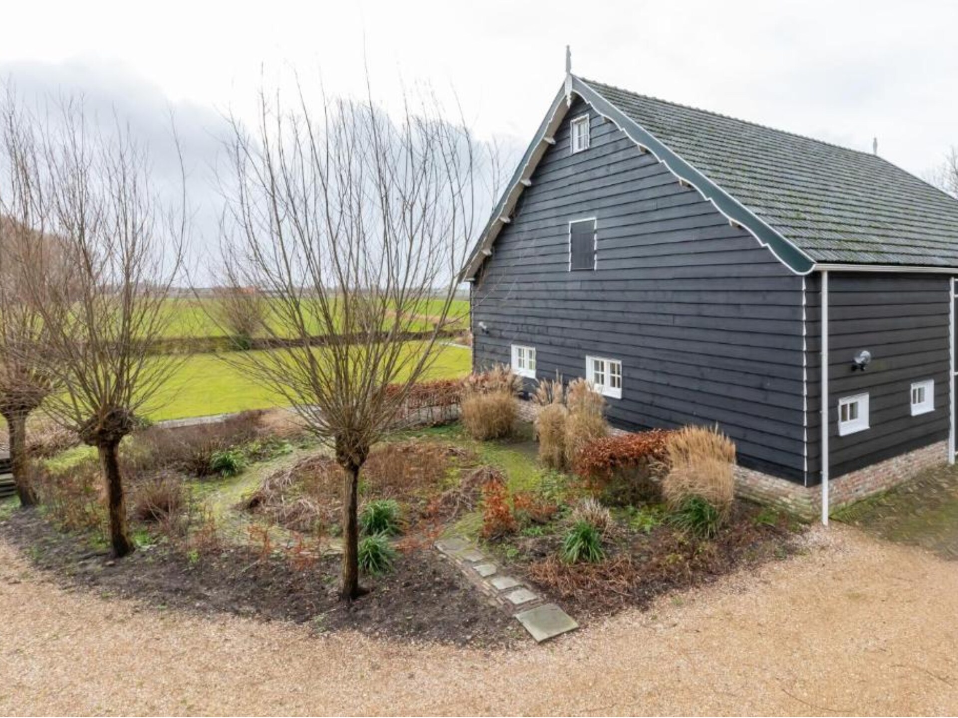De Kleine Pionier: Modern vakantiehuis met tuin in hartje Grijpskerke - foto 19