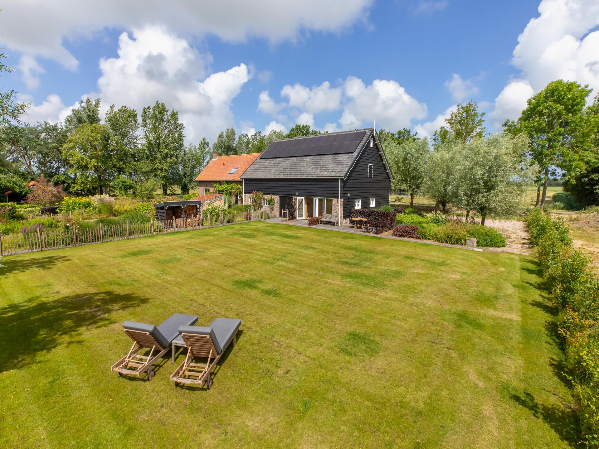 De Kleine Pionier: Modern vakantiehuis met tuin in hartje Grijpskerke - foto 5