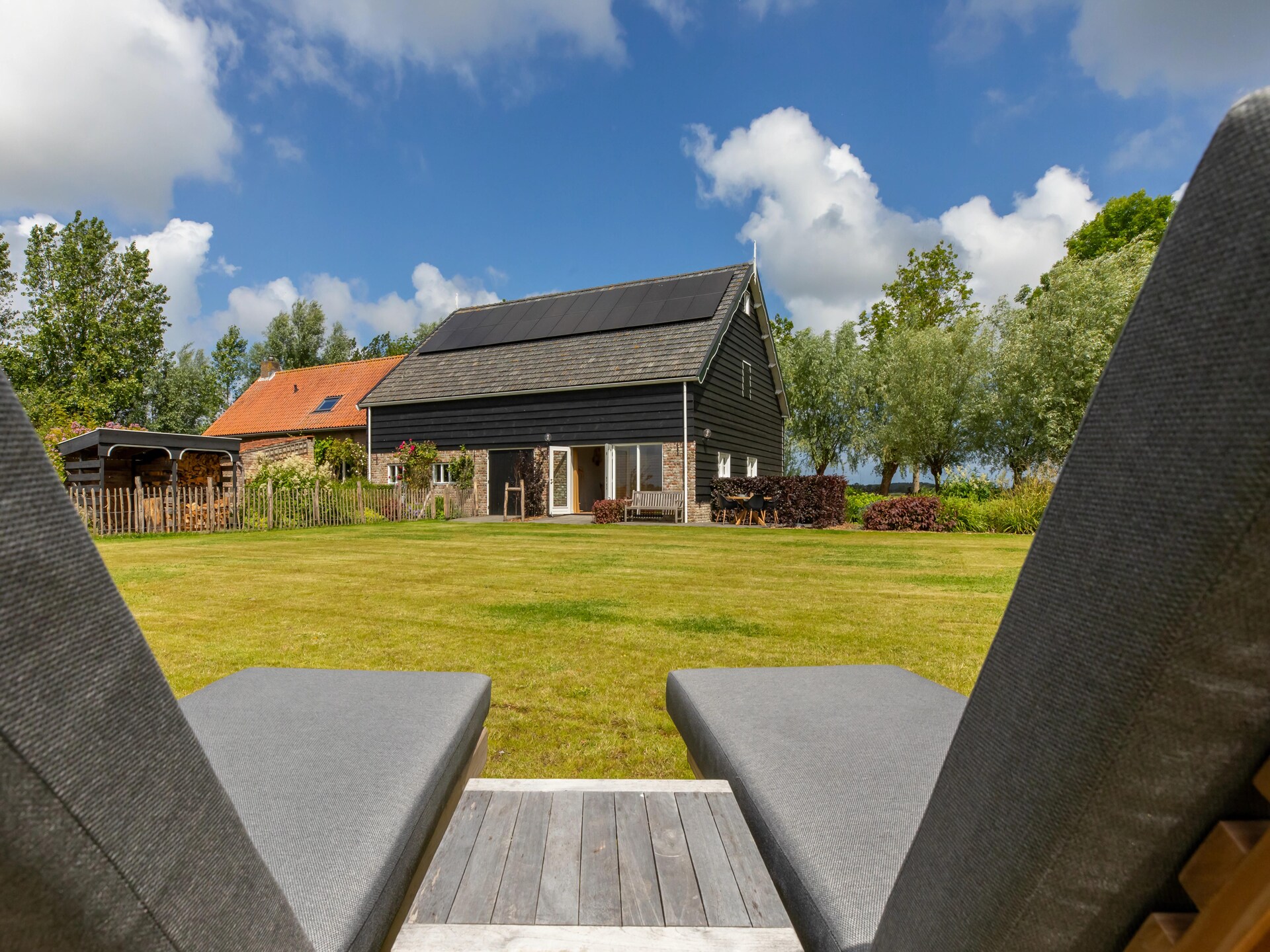 De Kleine Pionier: Modern vakantiehuis met tuin in hartje Grijpskerke - foto 30