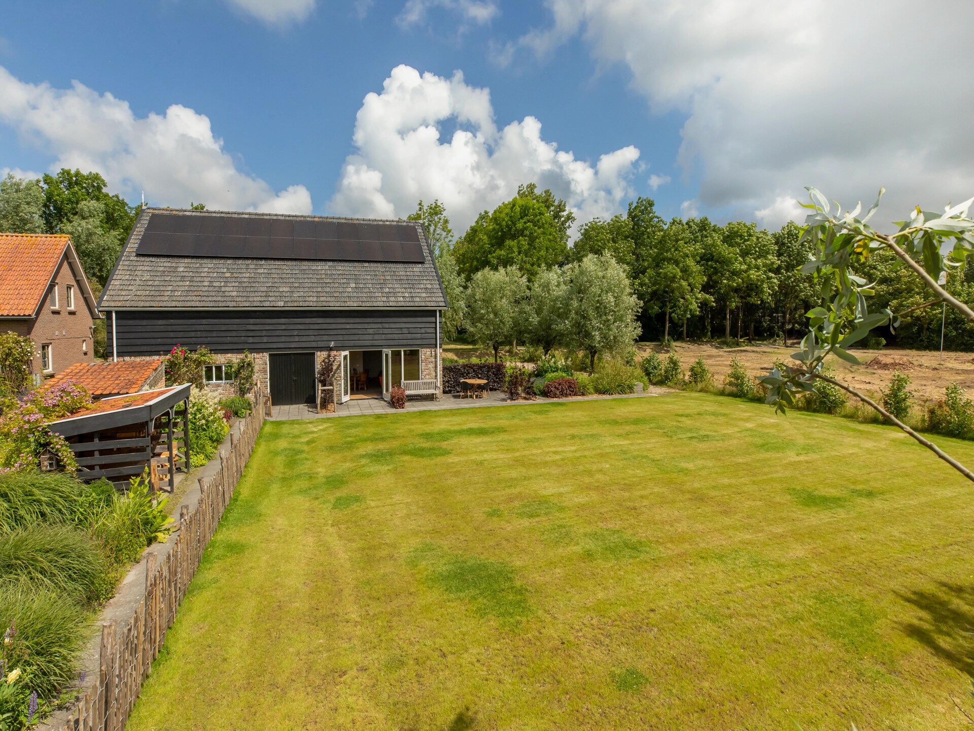 De Kleine Pionier: Modern vakantiehuis met tuin in hartje Grijpskerke - foto 8