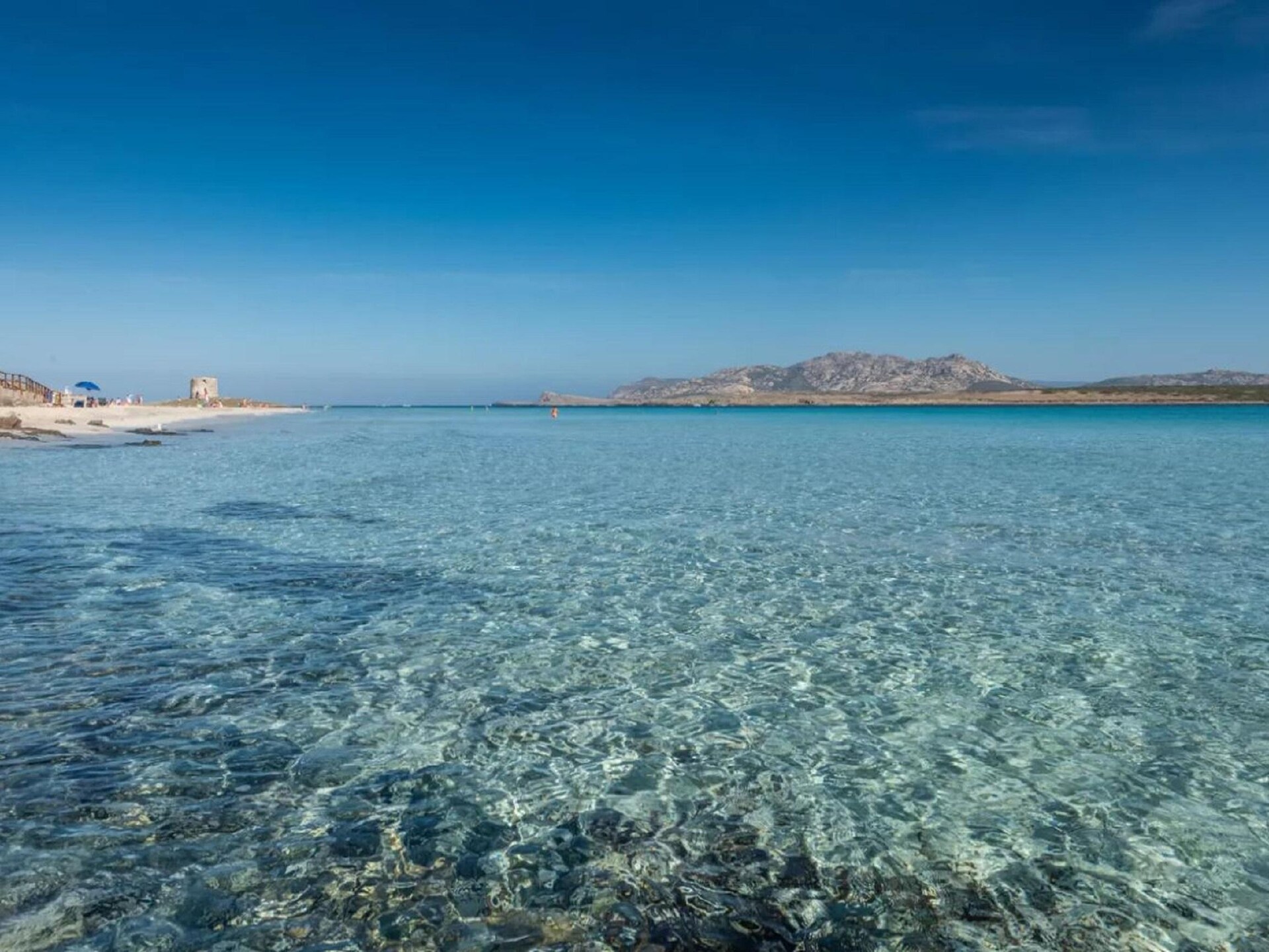 Vrijstaand huisje met tuin op 400 m van het strand van Stintino - foto 23