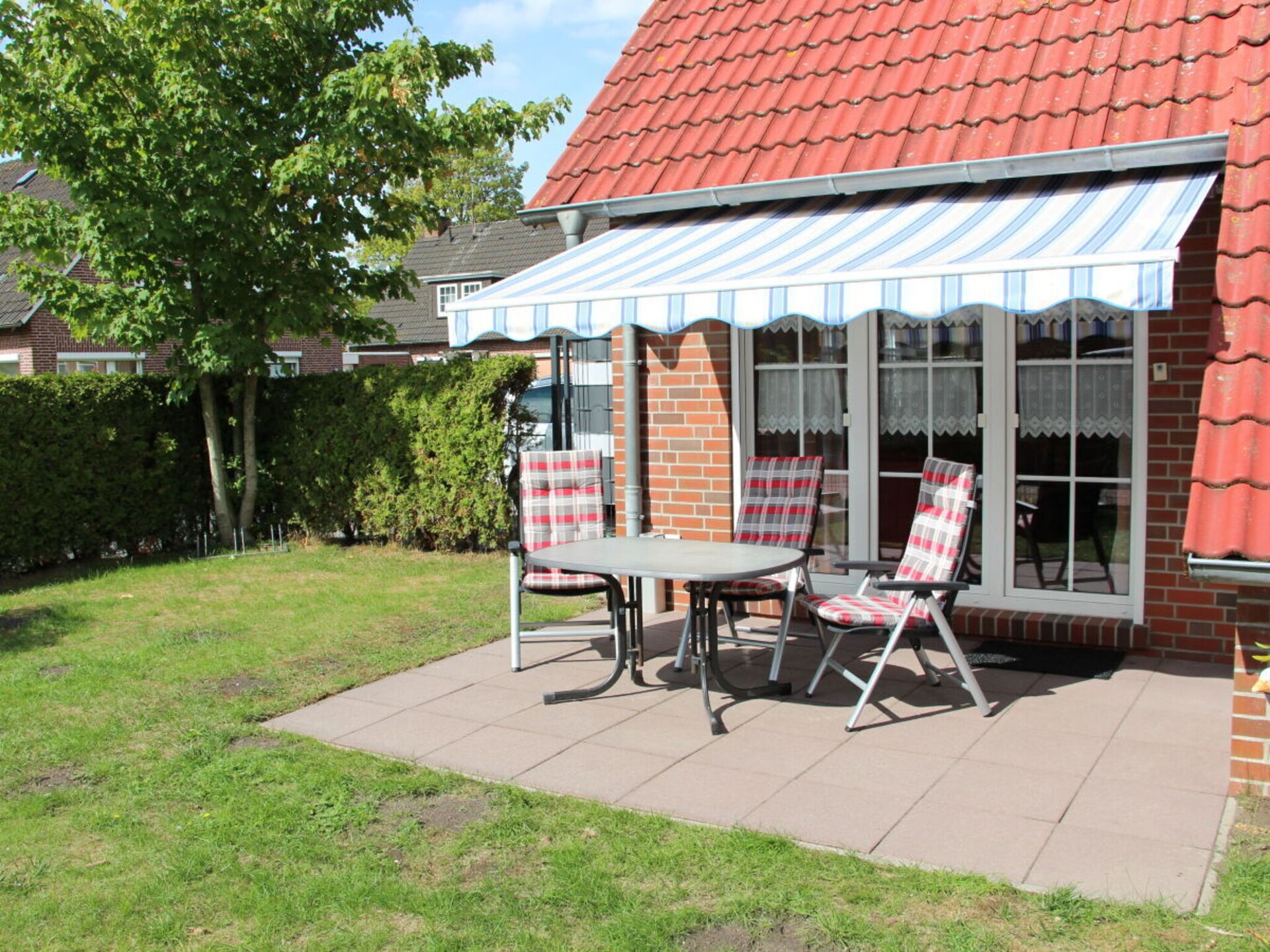 Knus vakantiehuis in Wittmund, 300m van centrum, met tuin en strandstoel - foto 17