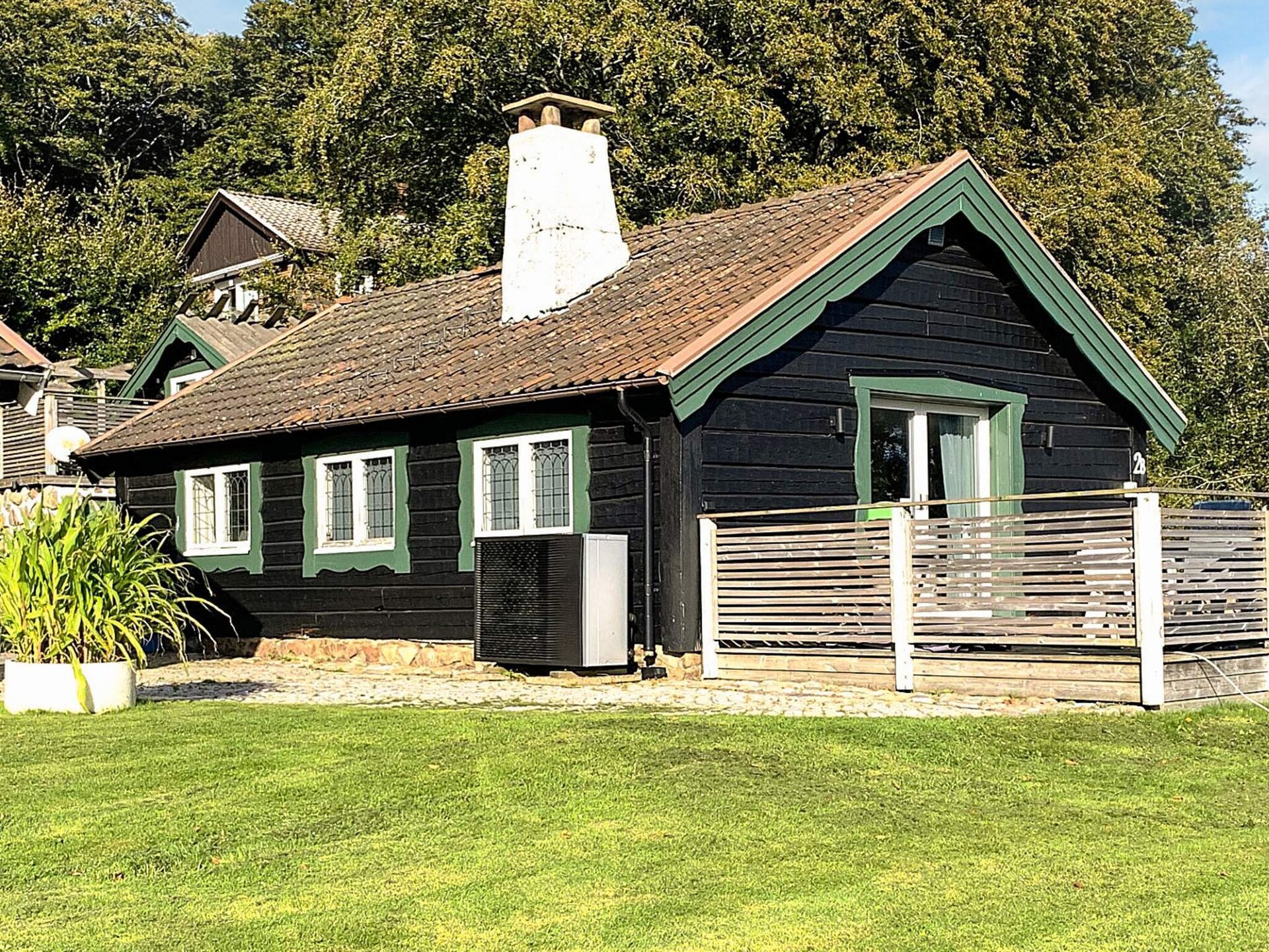 Knus houten vakantiehuis op golfbaan Bjäre met weids uitzicht - foto 1