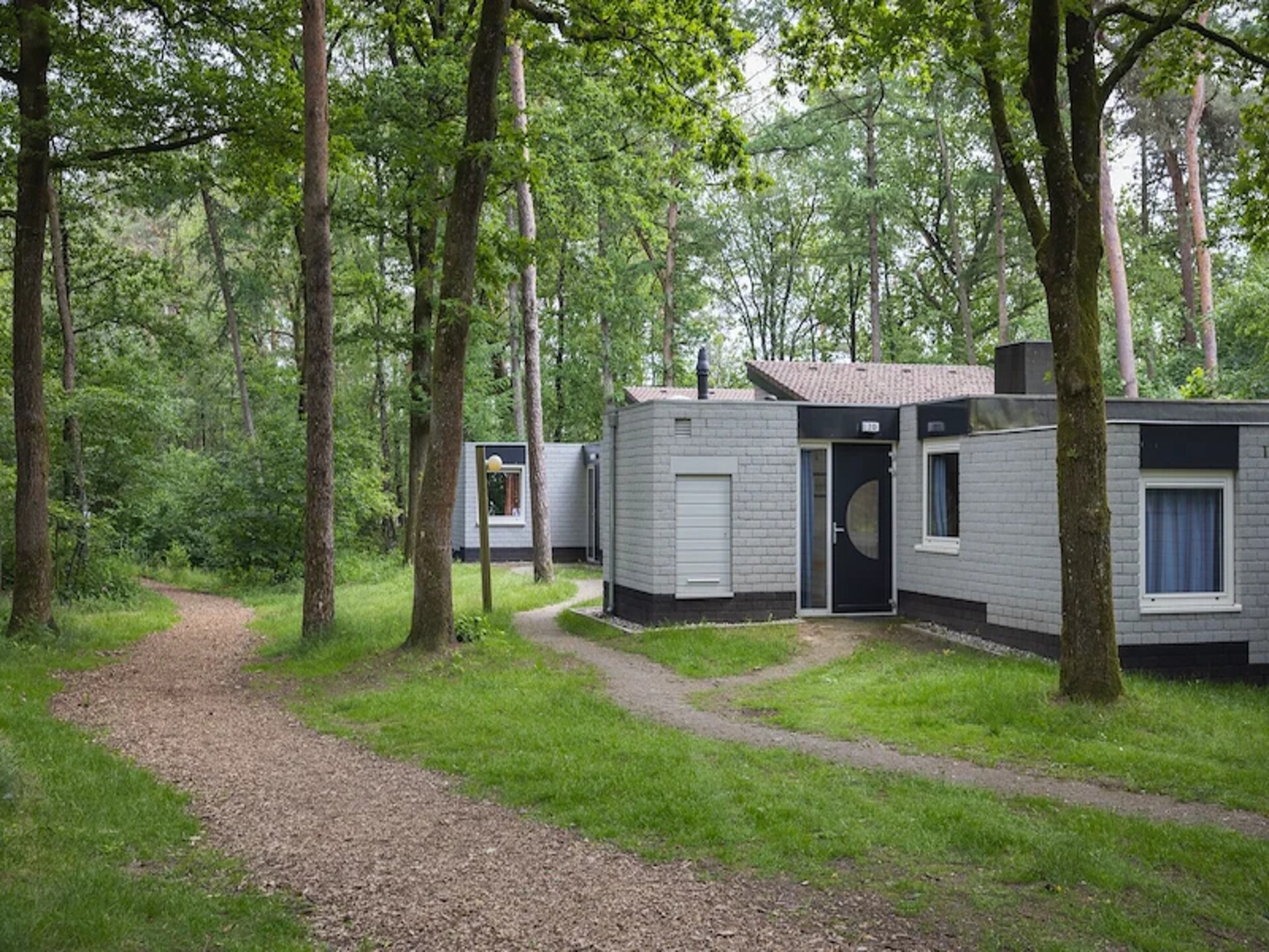 Romantische bosbungalow voor 2 op autovrij Veluws vakantiepark - foto 1