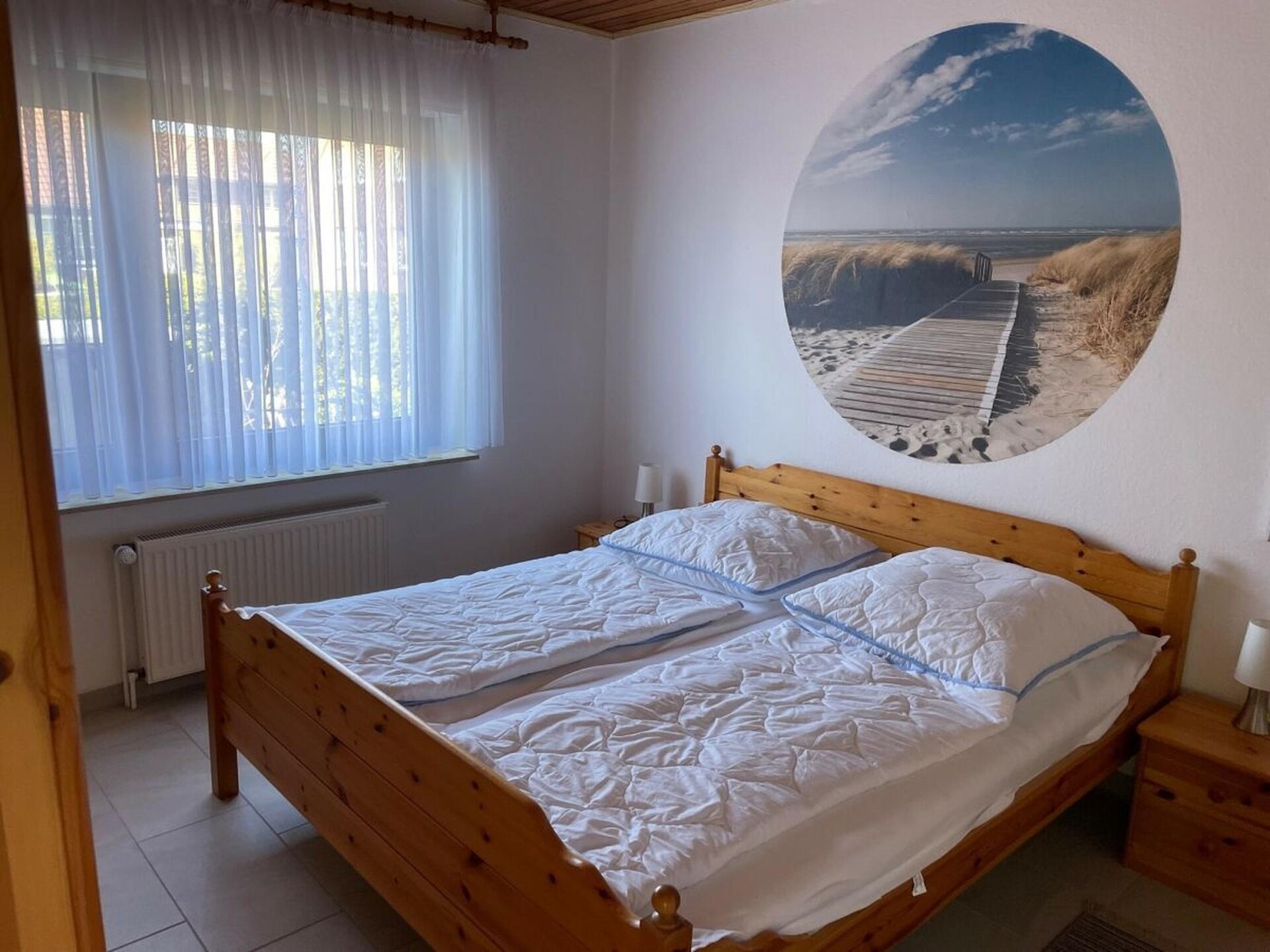 Liefdevolle bungalow op één niveau nabij strand Neßmersiel - foto 11