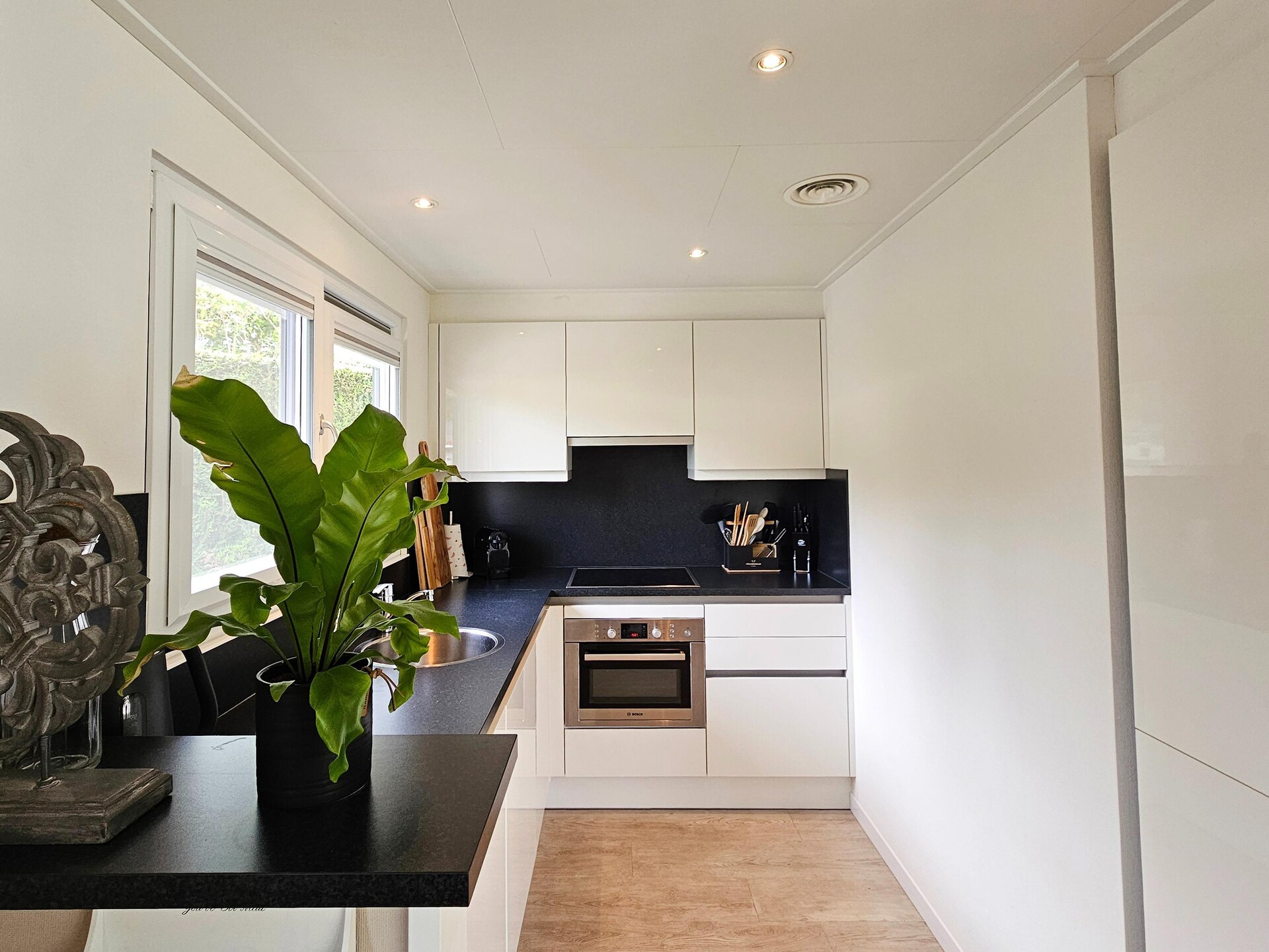 Bamboo House op de Veluwe: wellnessvilla aan rustig water voor 7 personen - foto 12