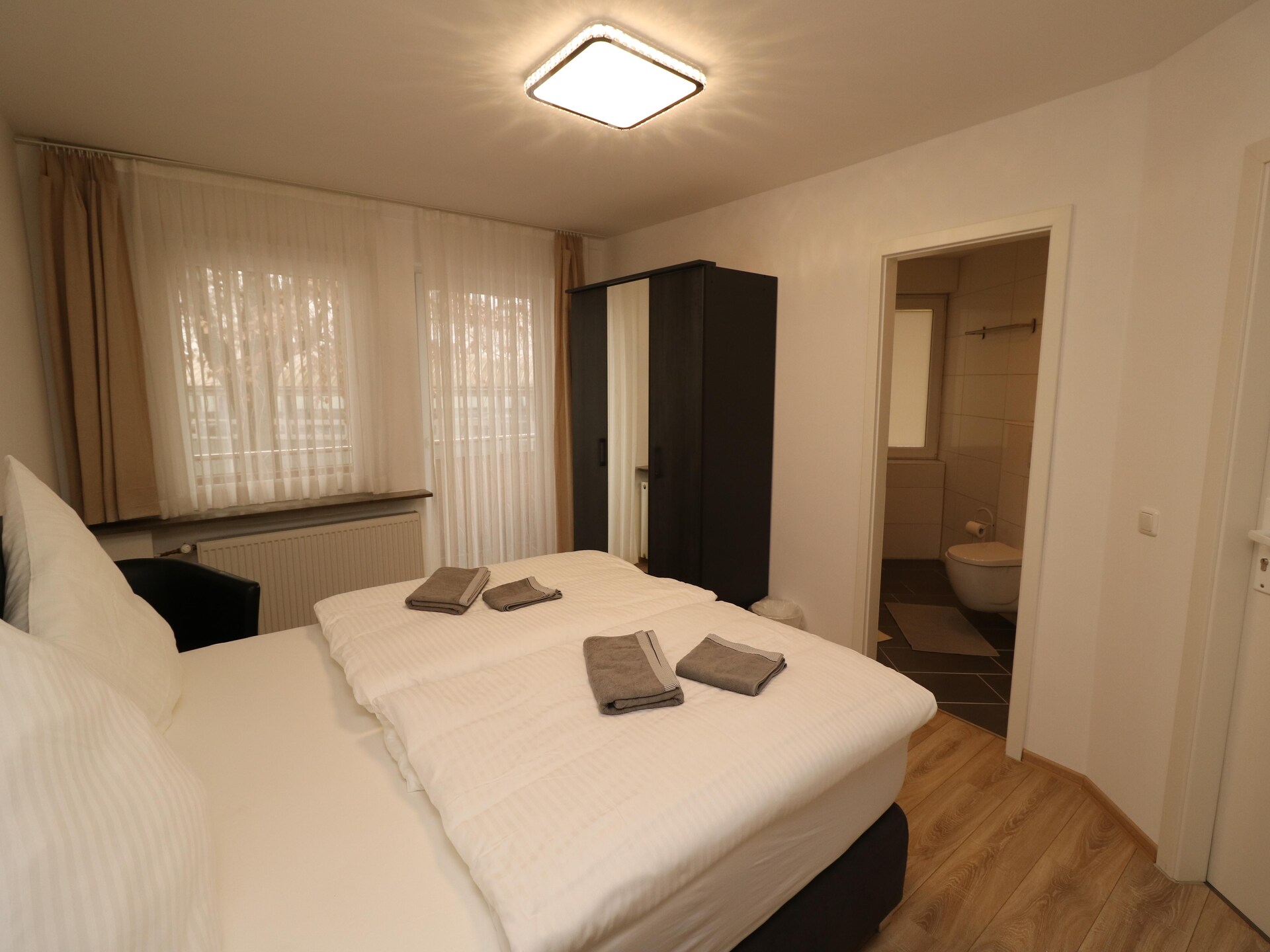 Licht appartement met gedeelde tuin op 3 km van centrum Essen - foto 11