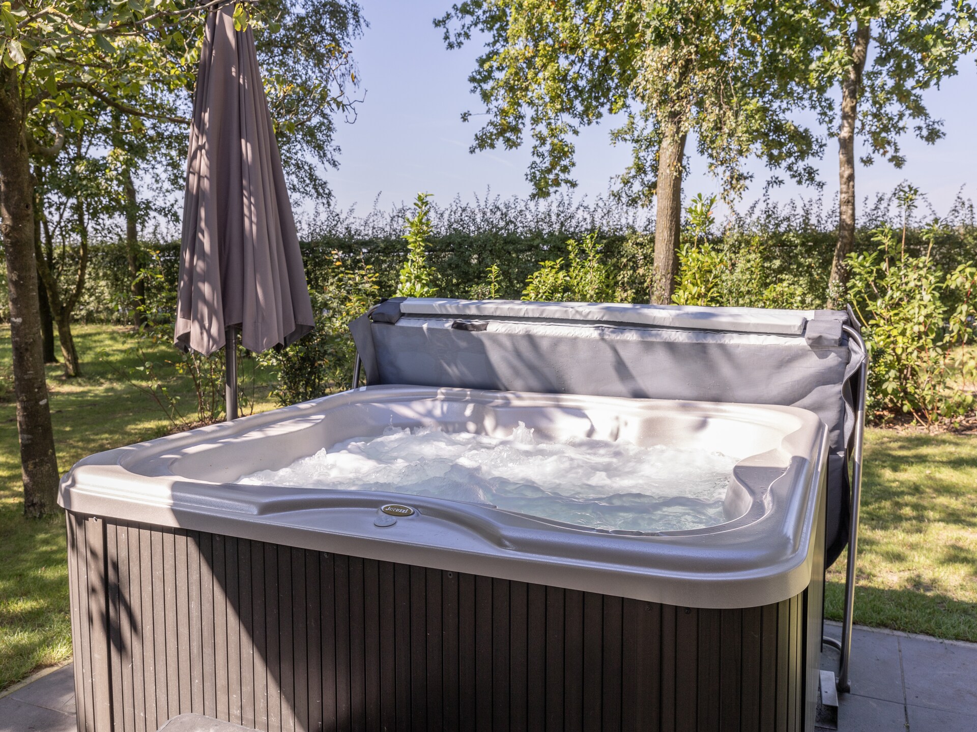 Luxe vakantiehuis met jacuzzi en sauna op groen vakantiepark in Brabant - foto 37