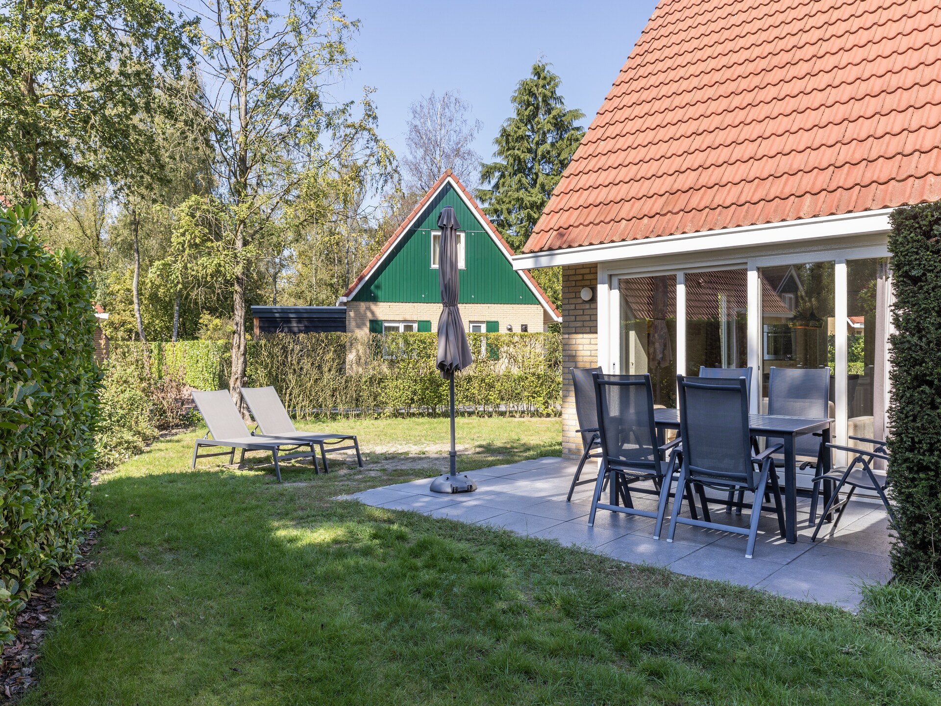 Vrijstaand vakantiehuis met sauna op bosrijk park in Noord-Brabant - foto 11