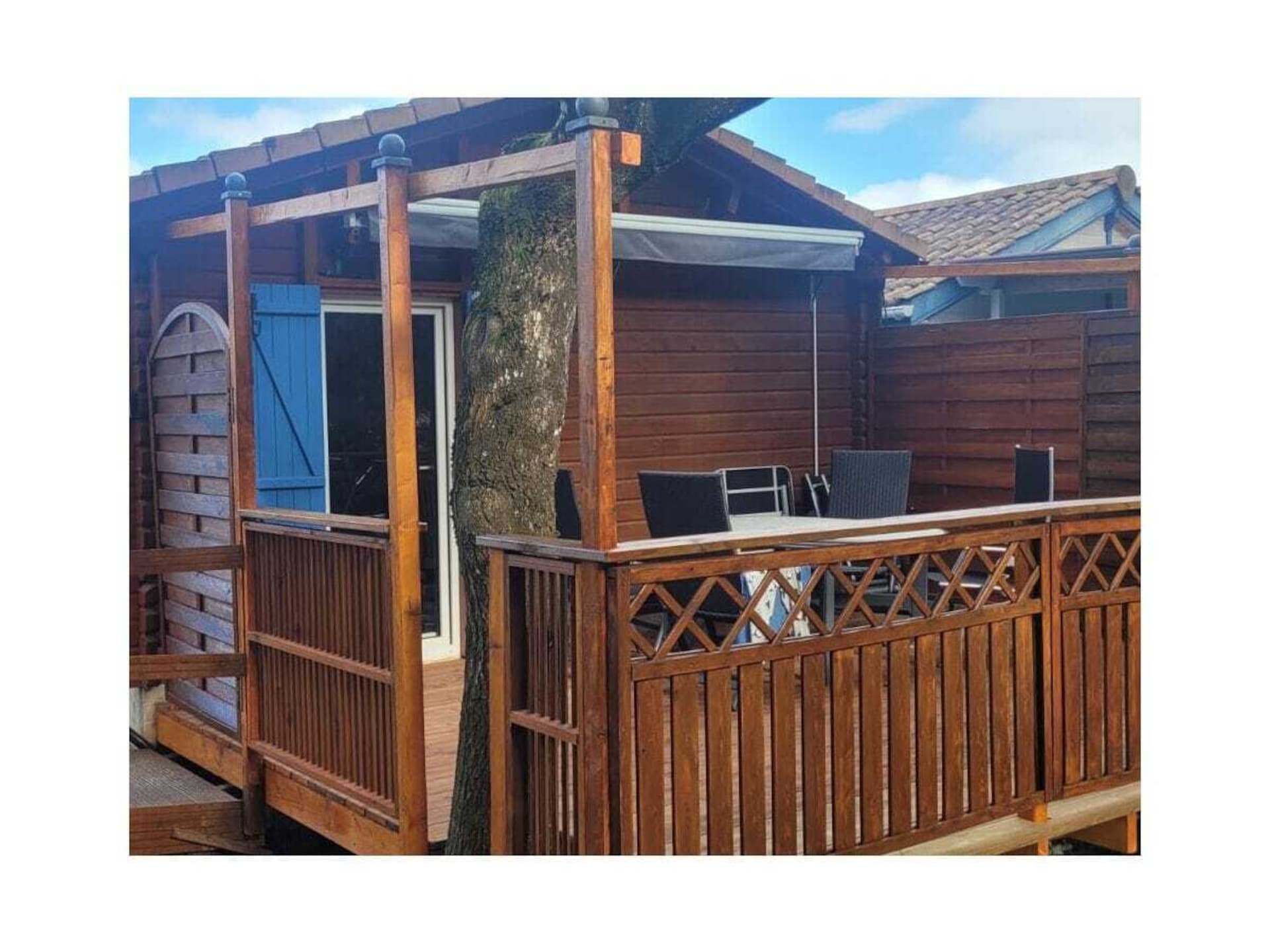 Knus houten vakantiehuis met veranda op 10 minuten van de Atlantische Oceaan - foto 3