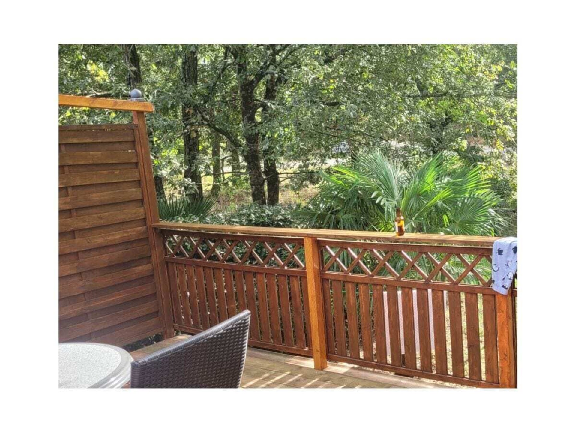Knus houten vakantiehuis met veranda op 10 minuten van de Atlantische Oceaan - foto 5