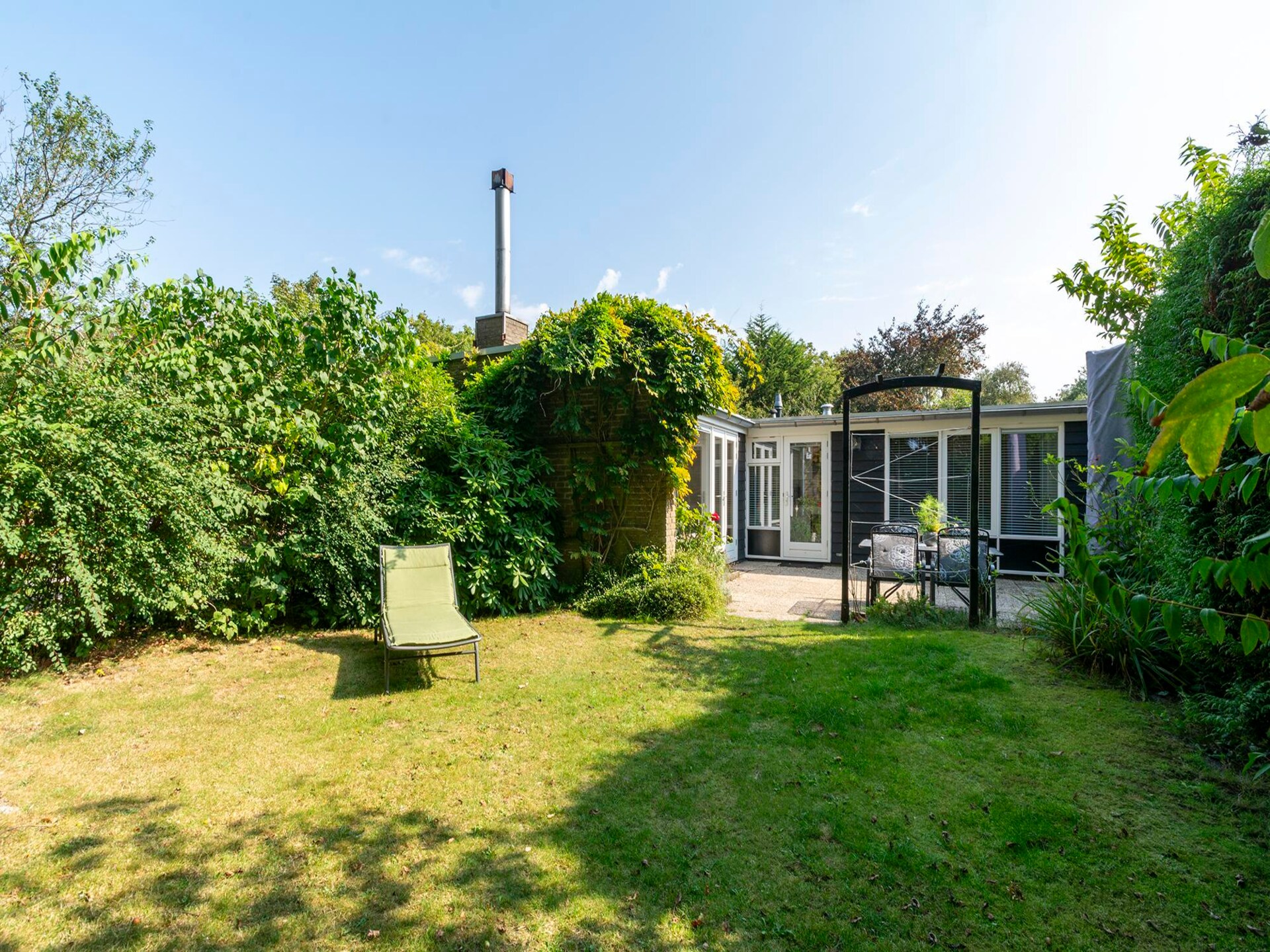Gezellige vrijstaande bungalow in Sint Maartenszee, 4 km van het strand - foto 29