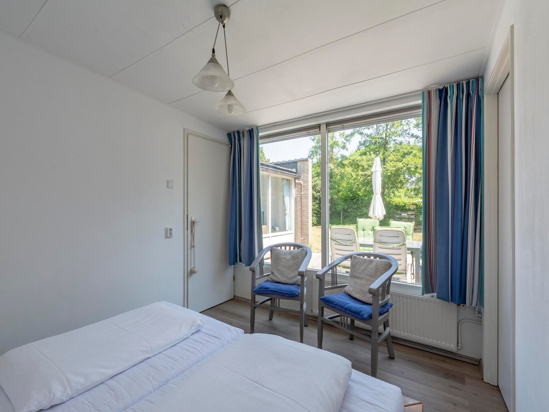 Vrijstaande bungalow met omheinde tuin, 4 km van strand Sint Maartenszee - foto 13