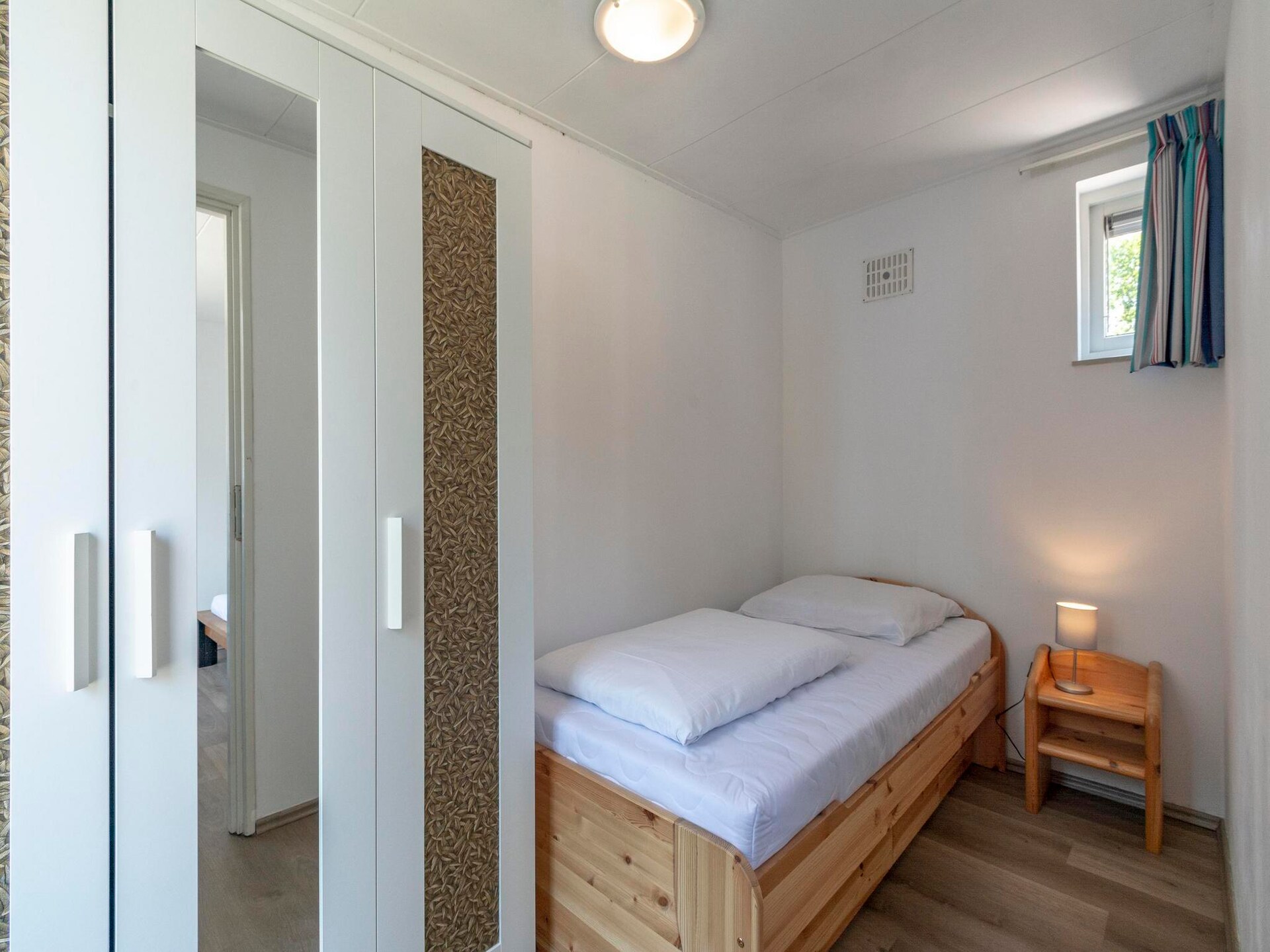 Vrijstaande bungalow met omheinde tuin, 4 km van strand Sint Maartenszee - foto 14