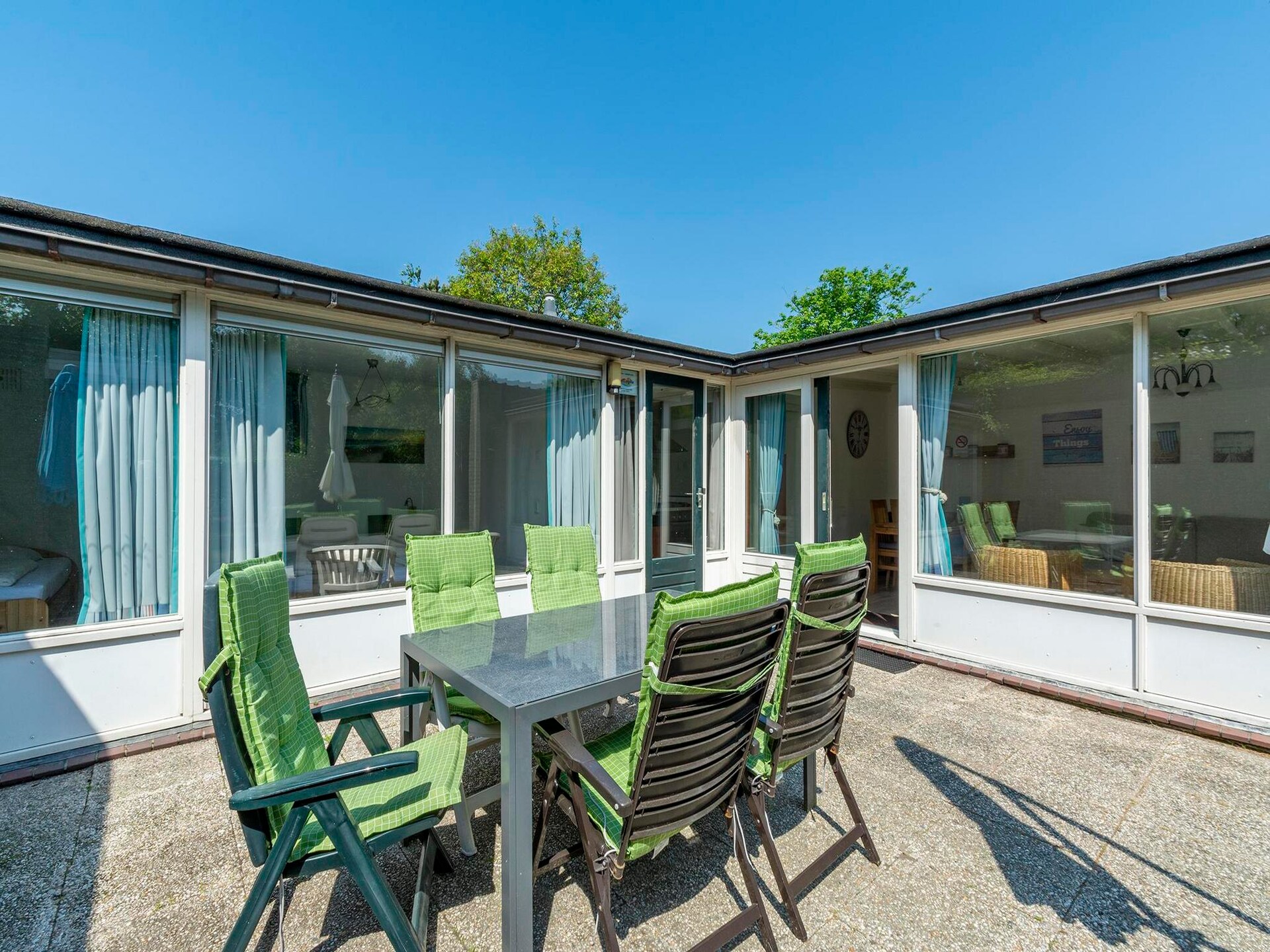 Vrijstaande bungalow met omheinde tuin, 4 km van strand Sint Maartenszee - foto 7