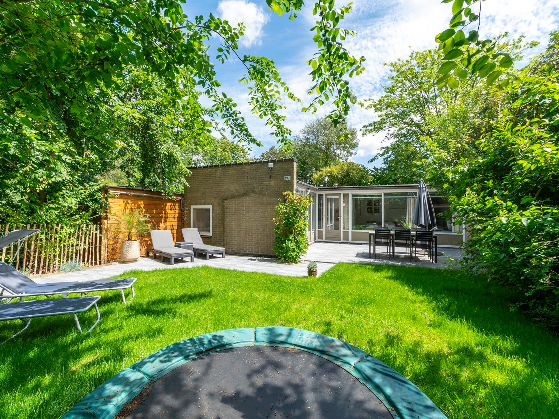 Vrijstaande vakantiebungalow Duinland 197 met groene tuin in Sint Maartenszee - foto 7