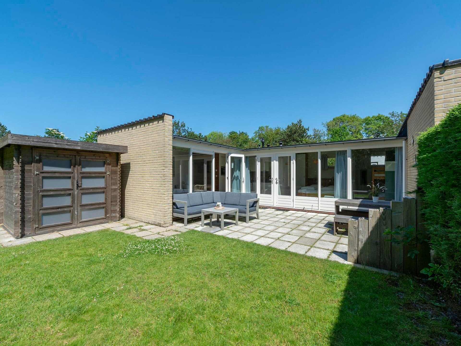 Vrijstaande kustbungalow met omheinde tuin in Sint Maartenszee - foto 7
