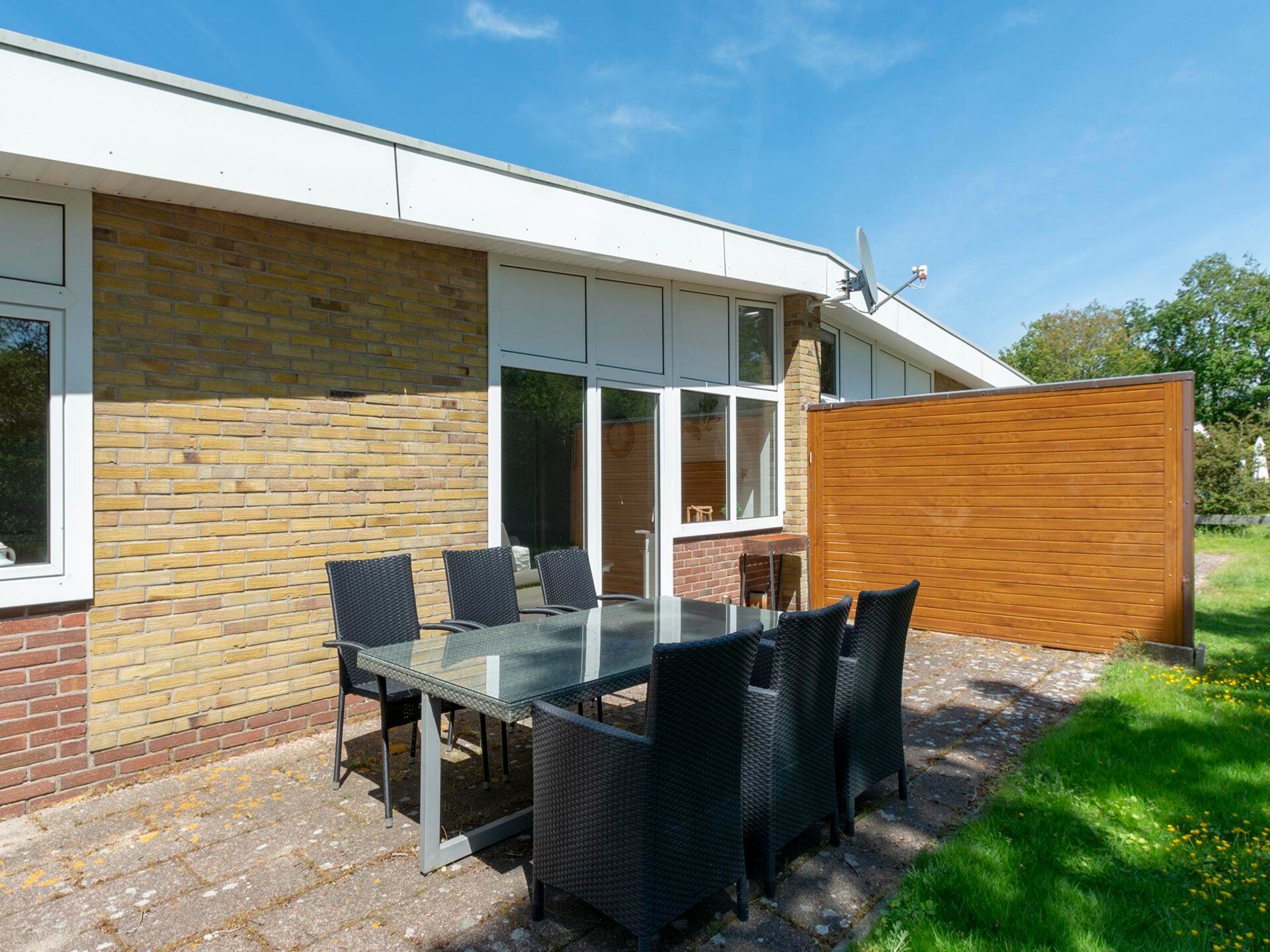 Knusse strandbungalow met omheinde tuin nabij Sint Maartenszee - foto 7