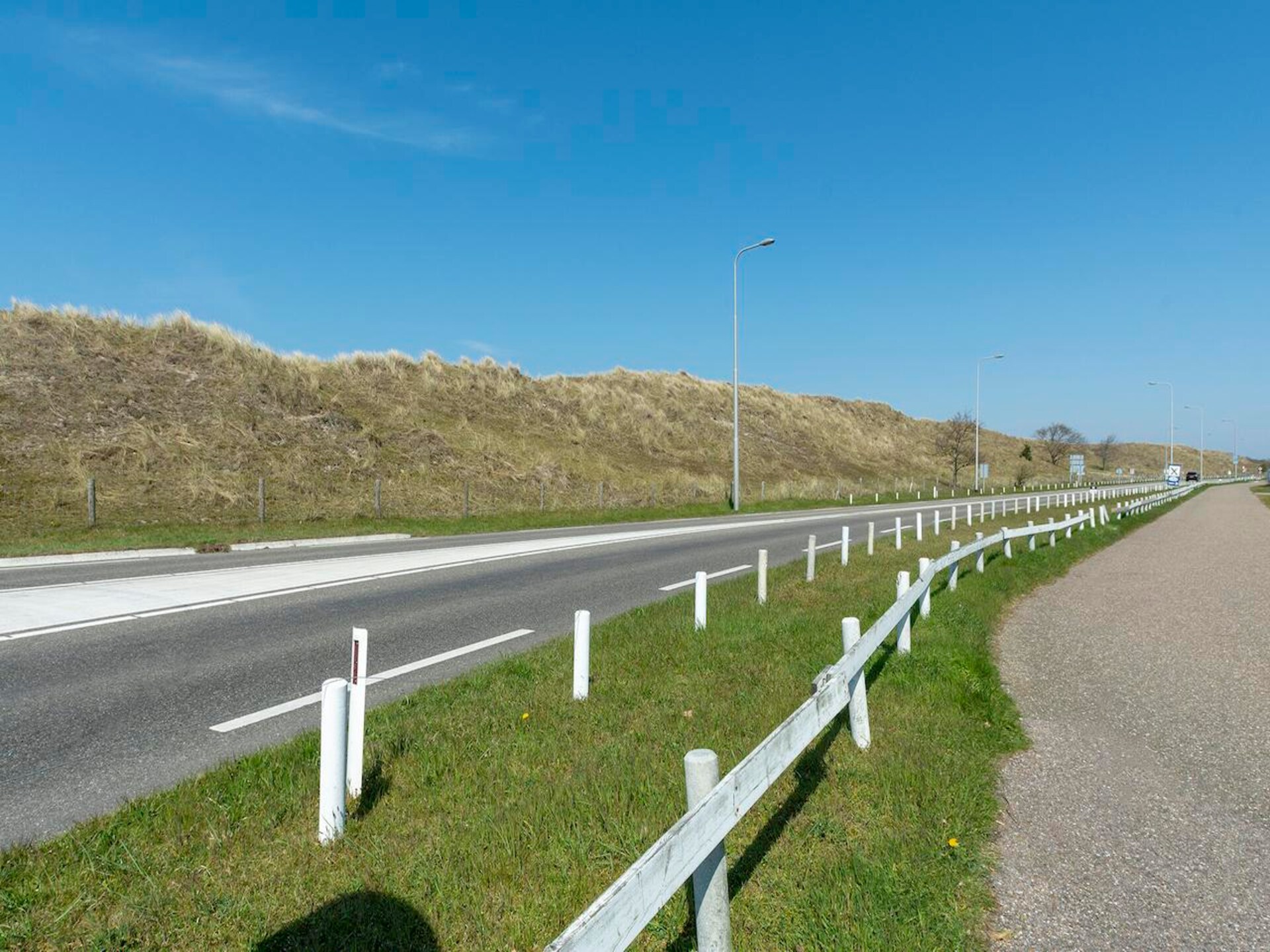 Knusse strandbungalow met omheinde tuin nabij Sint Maartenszee - foto 23