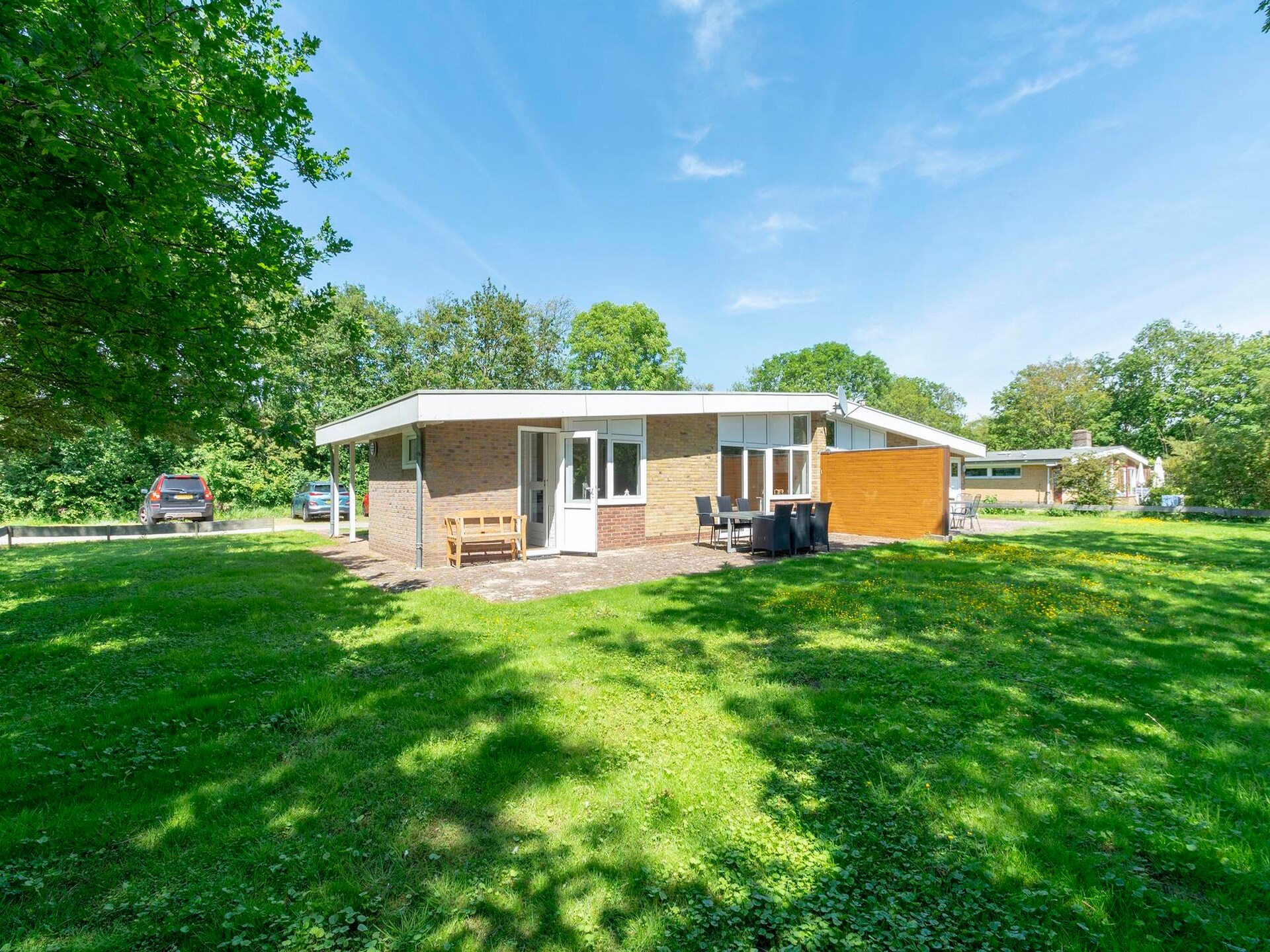 Knusse strandbungalow met omheinde tuin nabij Sint Maartenszee - foto 18