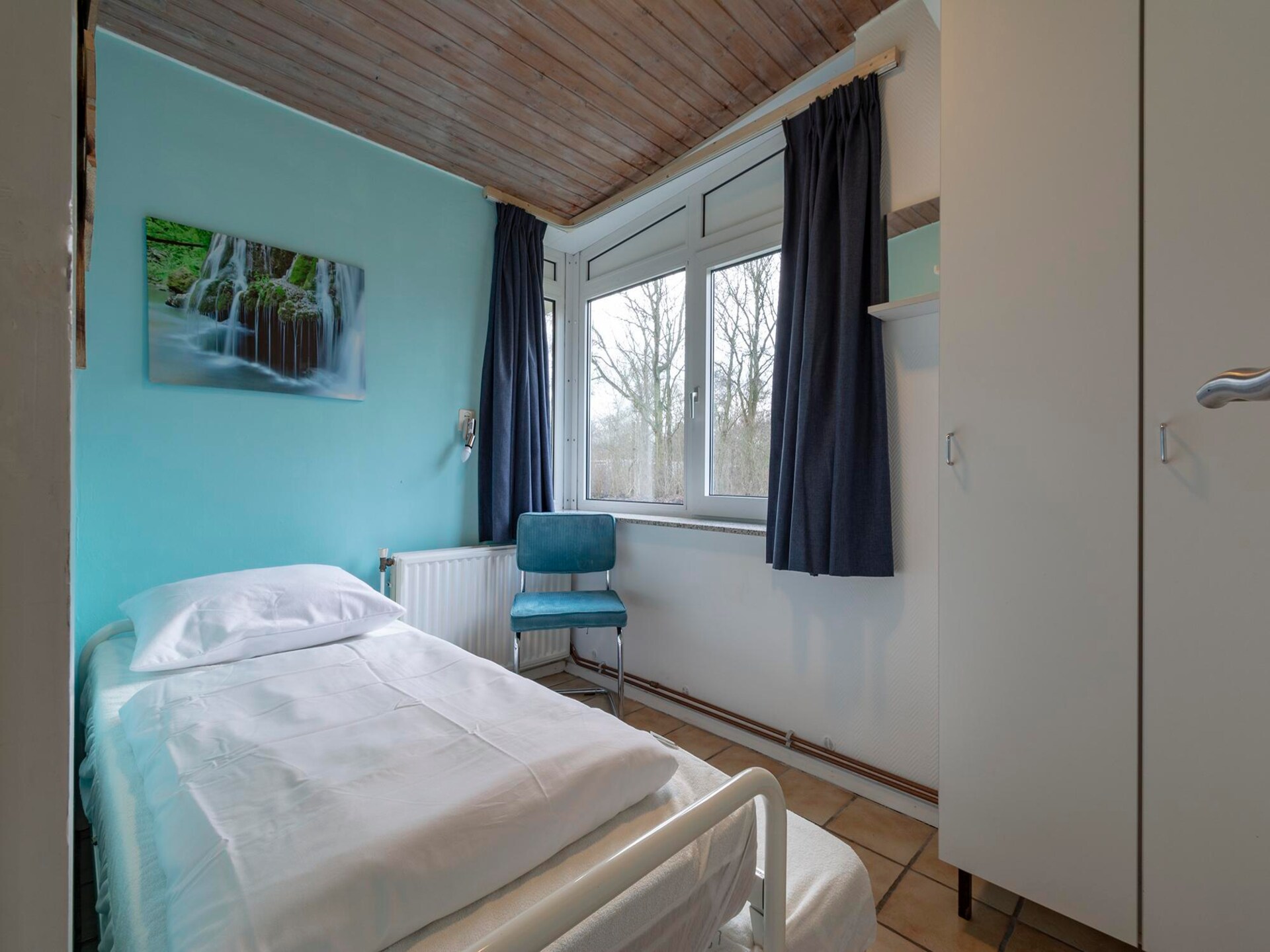 Knusse strandbungalow met omheinde tuin nabij Sint Maartenszee - foto 12