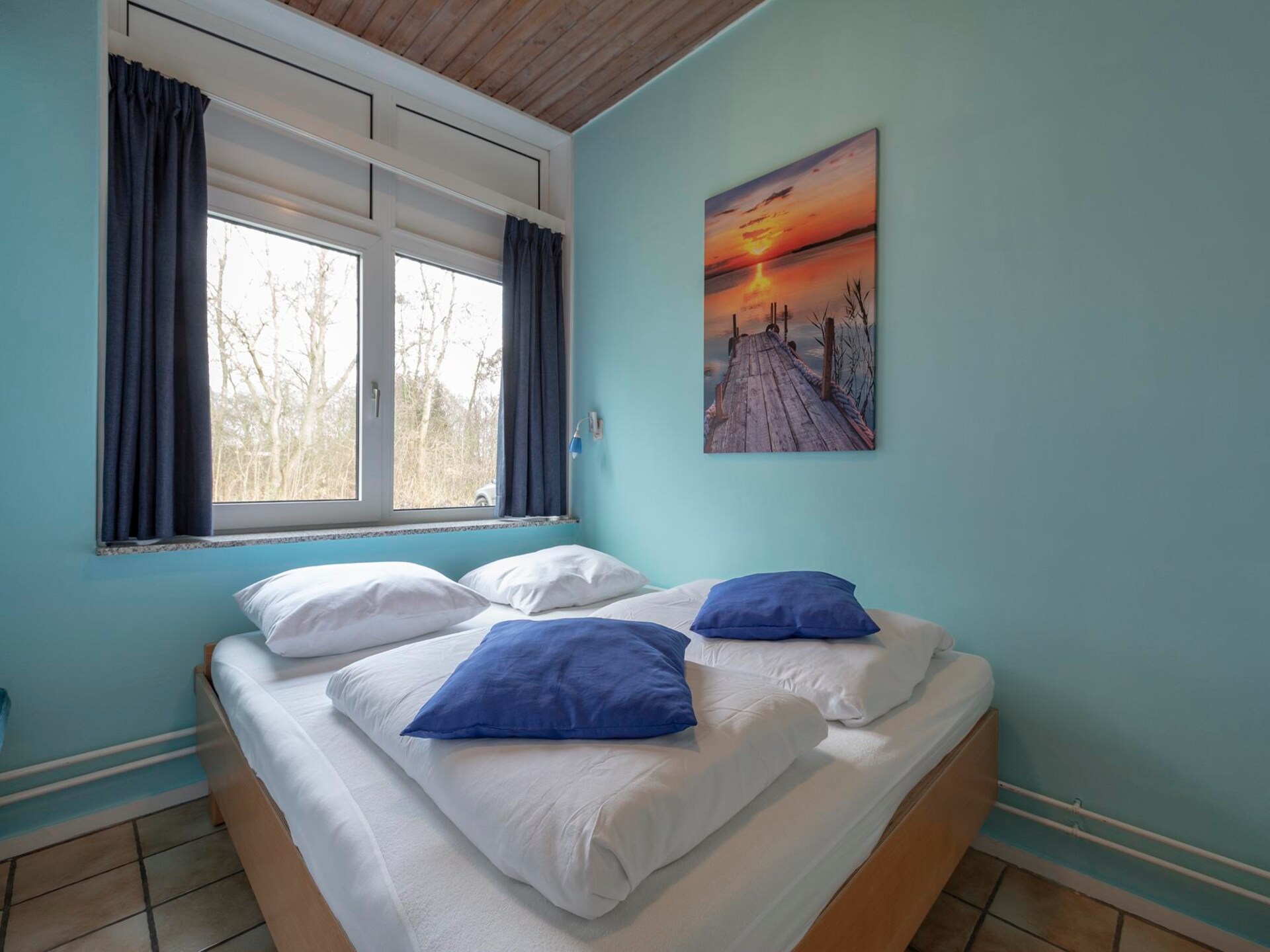 Knusse strandbungalow met omheinde tuin nabij Sint Maartenszee - foto 5