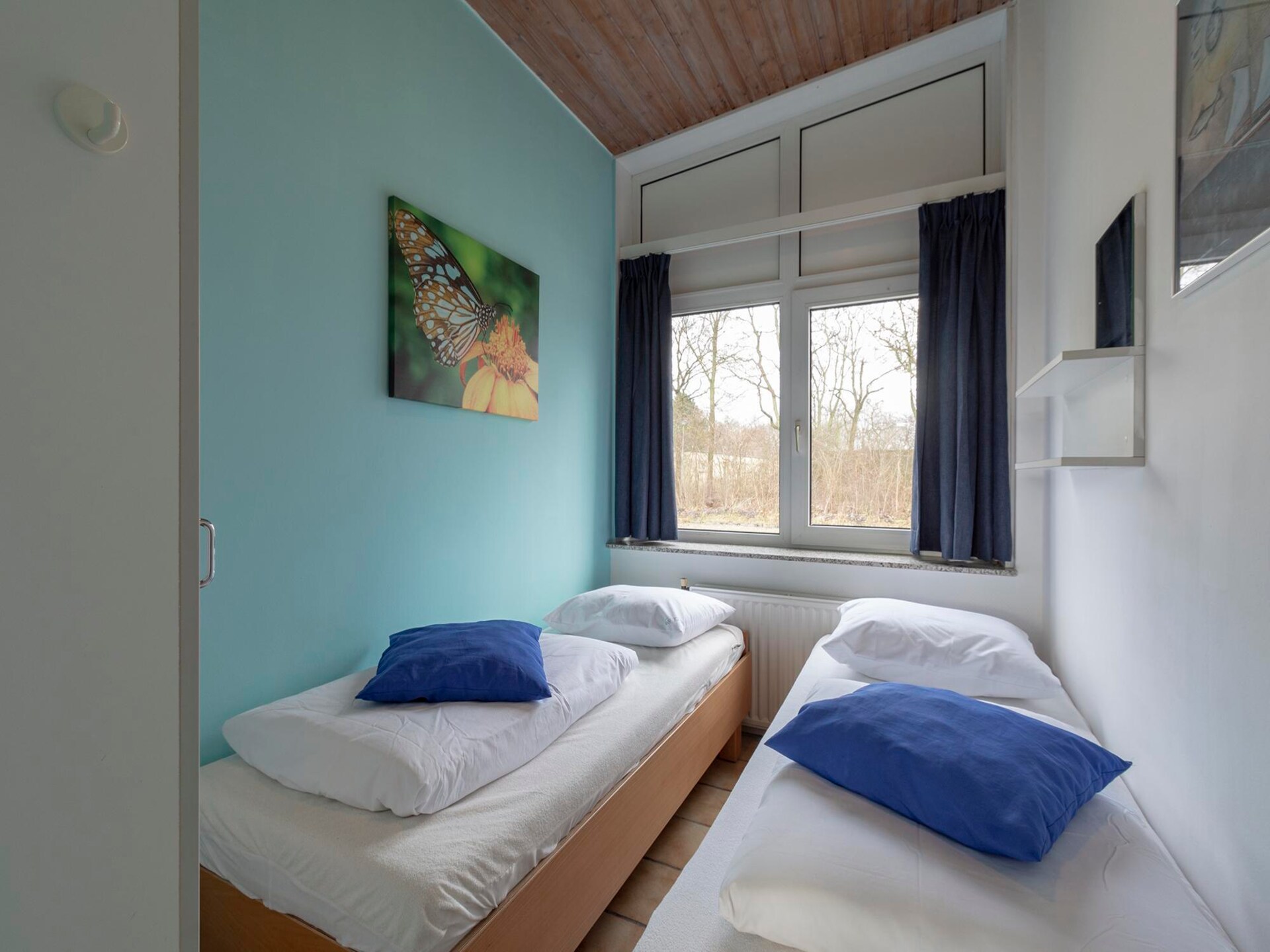 Knusse strandbungalow met omheinde tuin nabij Sint Maartenszee - foto 6