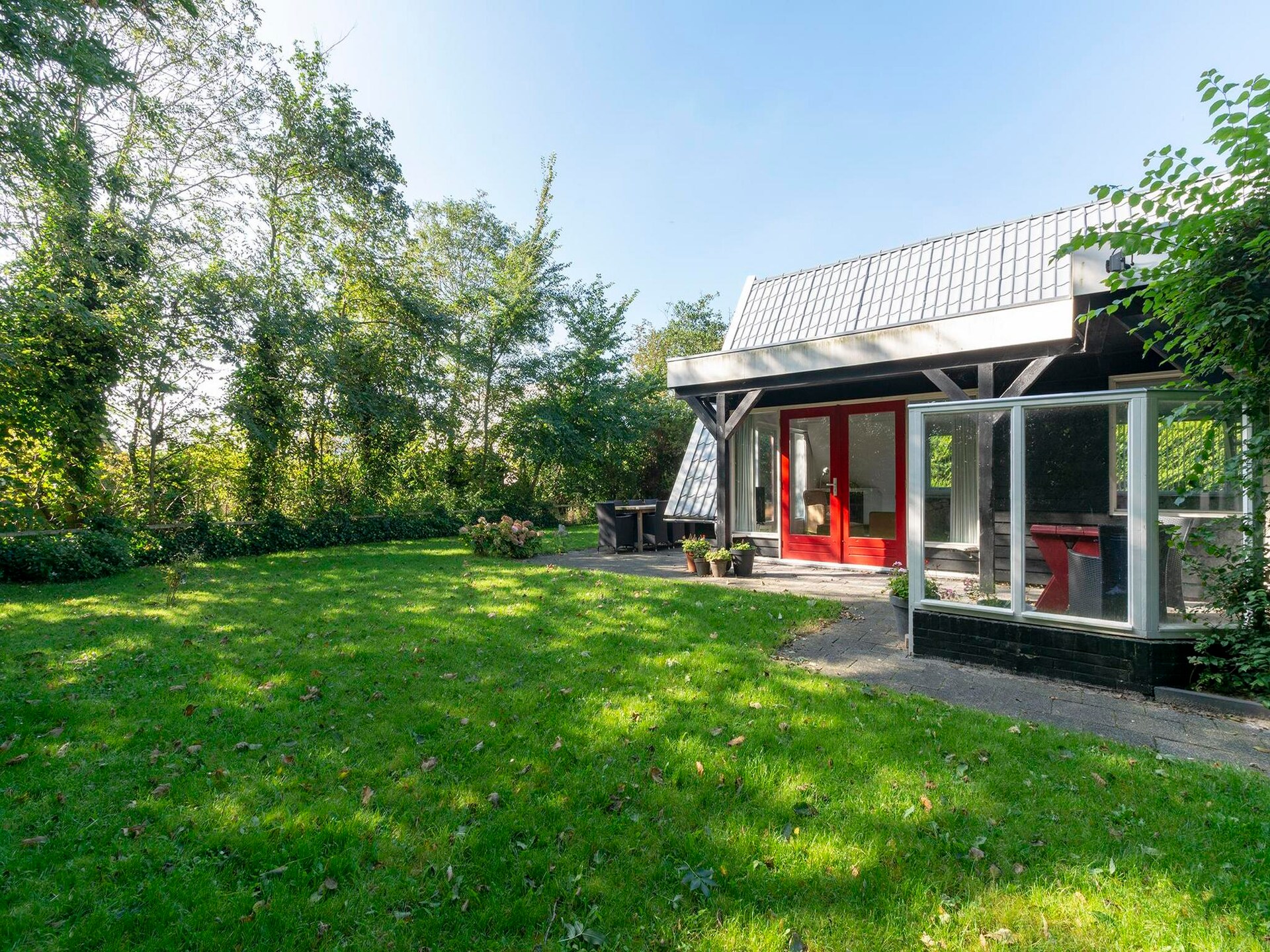 Villa Matisse: stijlvol familiehuis met omheinde tuin bij strand Callantsoog - foto 17