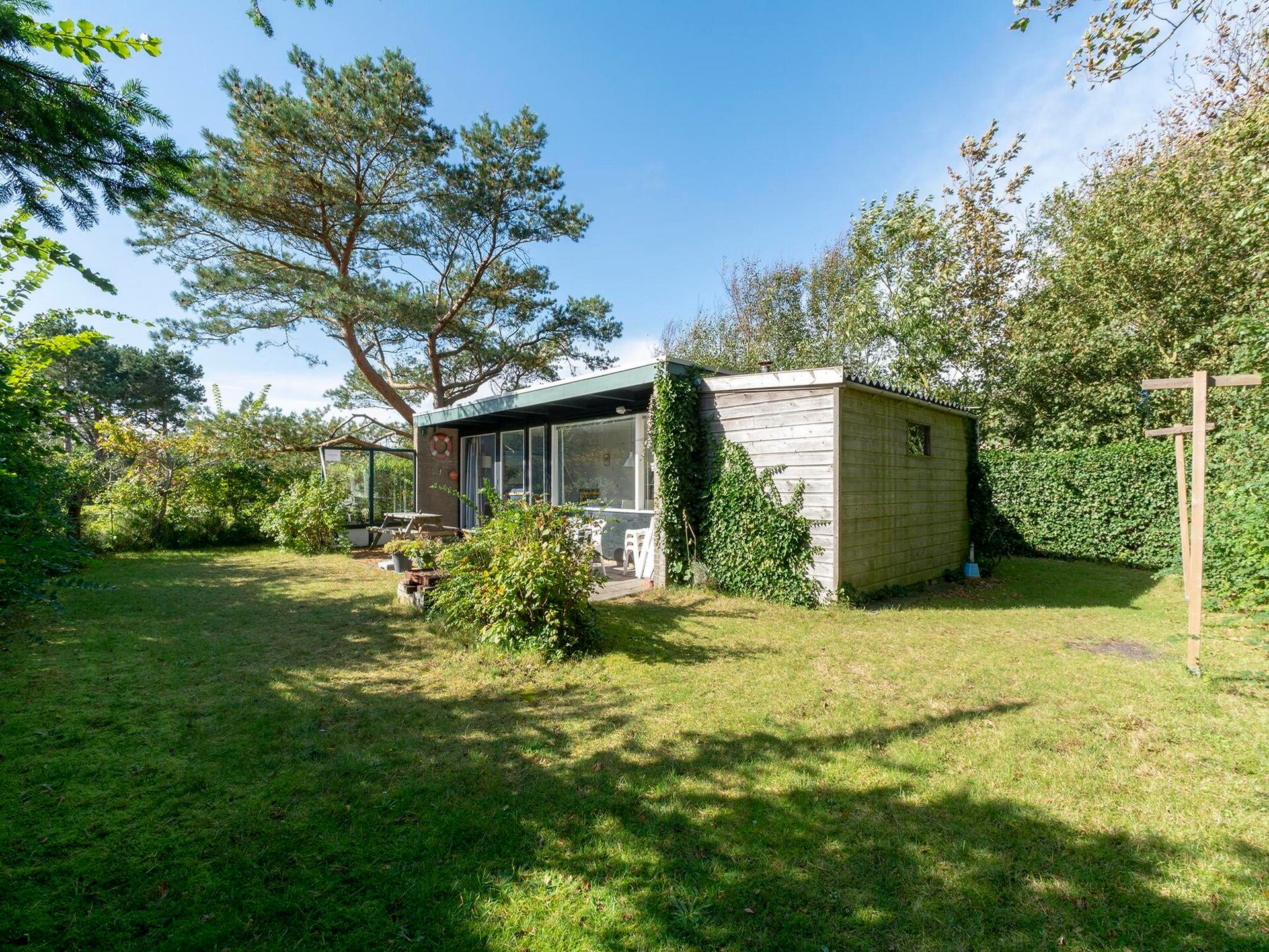 Vrijstaande familiebungalow bij strand van Callantsoog, autovrij park - foto 15