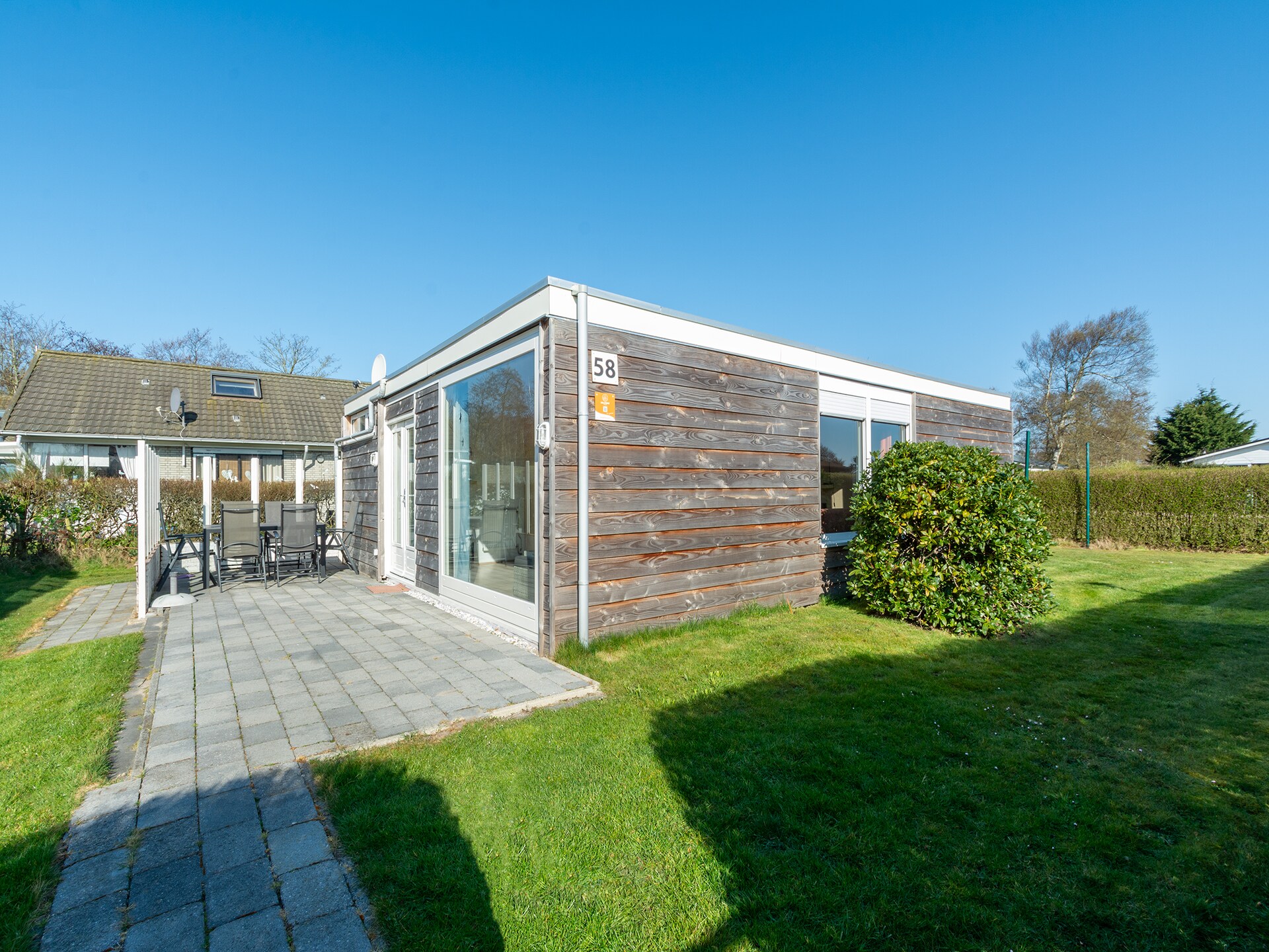 Vrijstaande zeebungalow met omheinde tuin op 1 km van het strand - foto 19