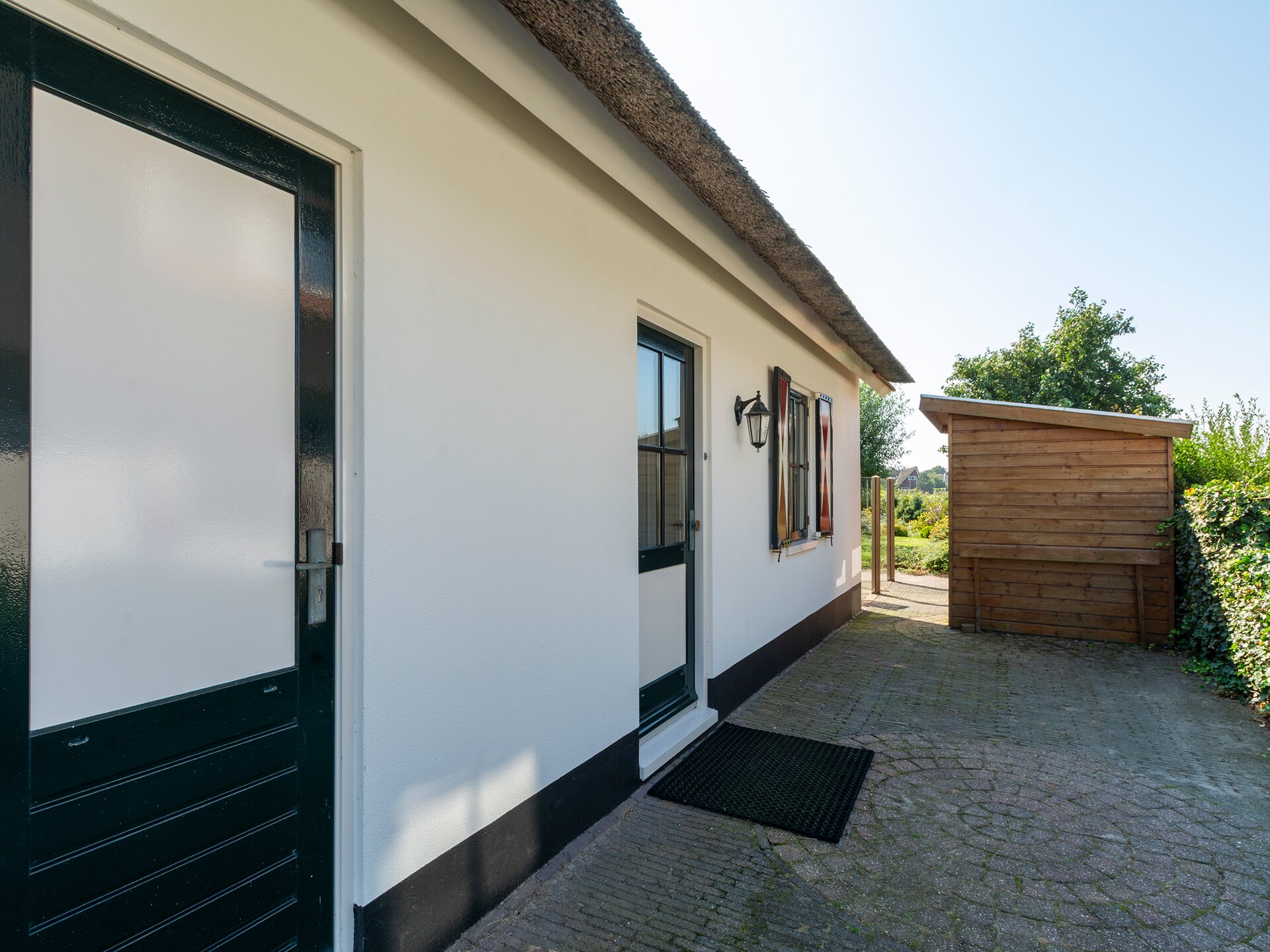Luxe rietgedekte villa aan het water met duinuitzicht in Callantsoog - foto 21