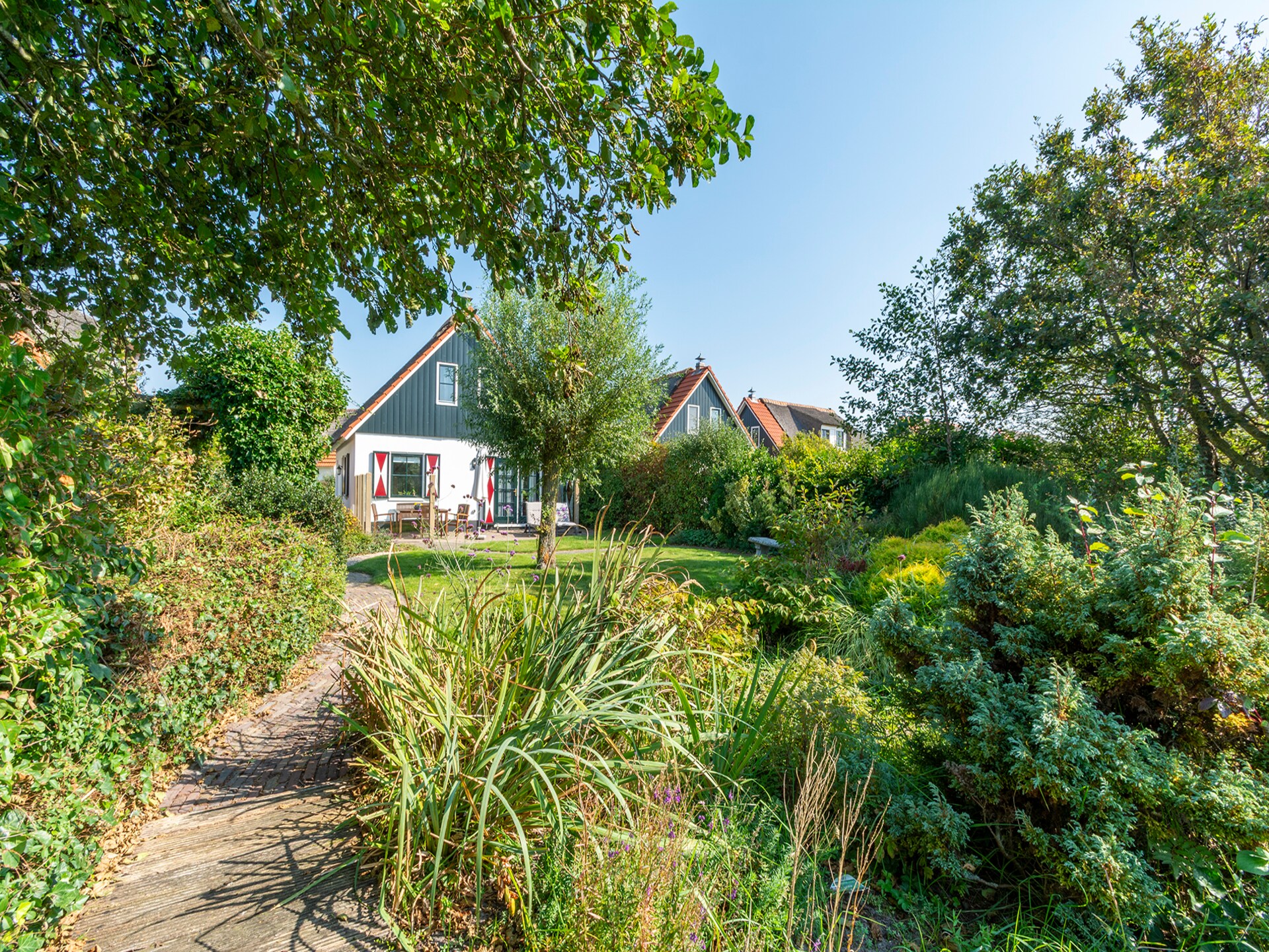 Luxe rietgedekte villa aan het water met duinuitzicht in Callantsoog - foto 26